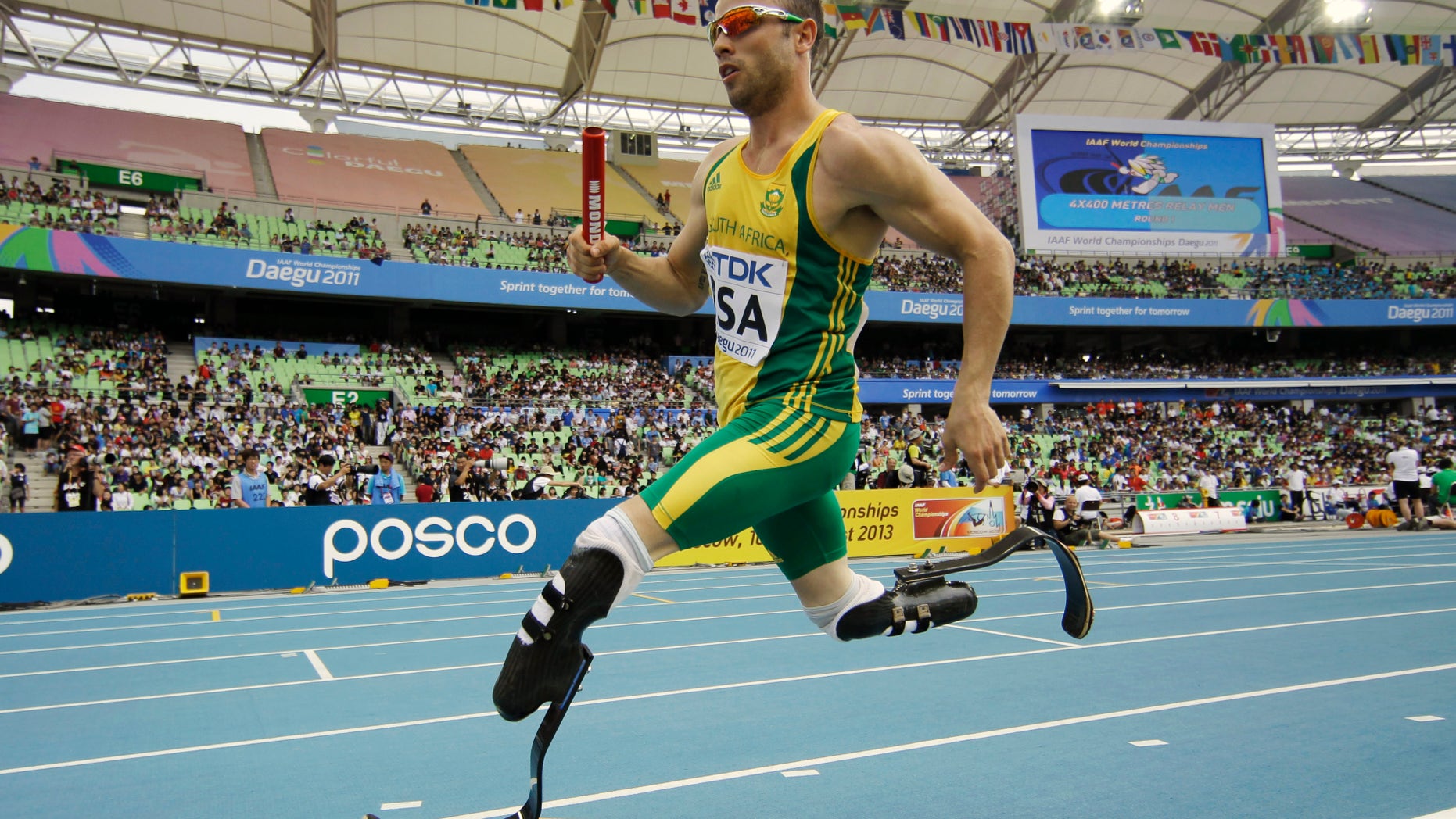 FILE - In this Sept. 1, 2011 file photo, South Africa's Oscar Pistorius competes in a qualification round for the Men's 4x400m relay at the World Athletics Championships in Daegu, South Korea. Double amputee Oscar Pistorius has been selected for South Africa's Olympic 4x400 relay team. (AP Photo/Matt Dunham, File)