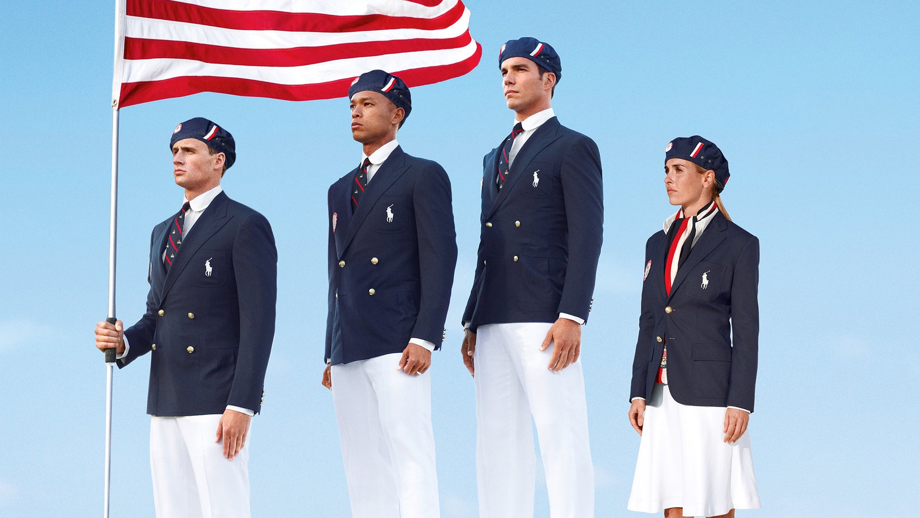 This product image released by Ralph Lauren shows U.S. Olympic athletes, from left, swimmer Ryan Lochte, decathlete Bryan Clay, rower Giuseppe Lanzone and soccer player Heather Mitts modeling the the official Team USA Opening Ceremony Parade Uniform.