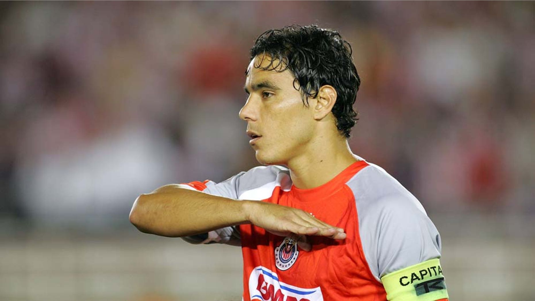 PASADENA, CA - SEPTEMBER 23: Omar Bravo #99 of Chivas de Guadalajara stands for the playing of the Mexican National Anthem prior to their International Club Friendly match against Chivas USA at the Rose Bowl on September 23, 2009 in Pasadena, California. Chivas de Guadalajara defeated Chivas USA 2-0. (Photo by Victor Decolongon/Getty Images)