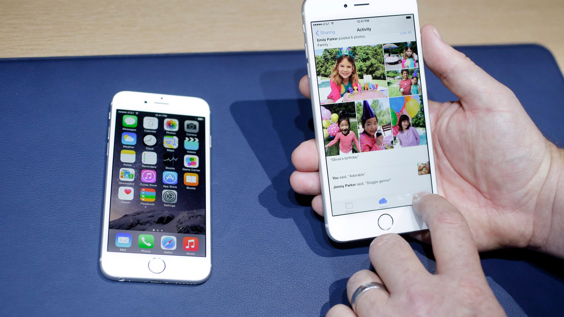 FILE - This Sept. 9, 2014 file photo shows the iPhone 6, at left, and iPhone 6 plus during a new product release in Cupertino, Calif. Selling your old phone online or to companies that buy back used models can often offer a better return than your wireless provider. (AP Photo/Marcio Jose Sanchez, File)