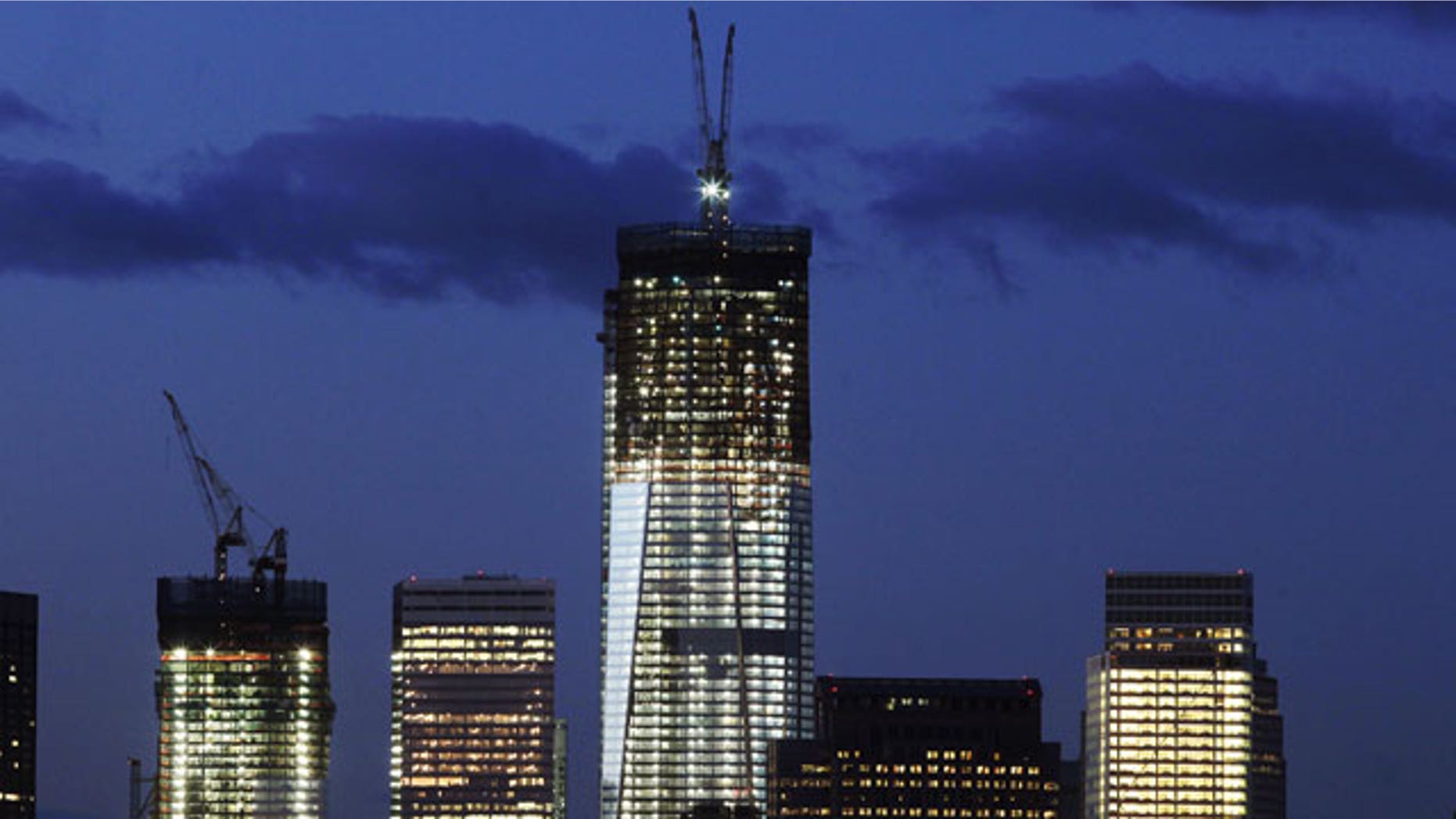 January 18, 2012: One World Trade Center, now up to the 90th floor, rises above the lower Manhattan skyline in New York.