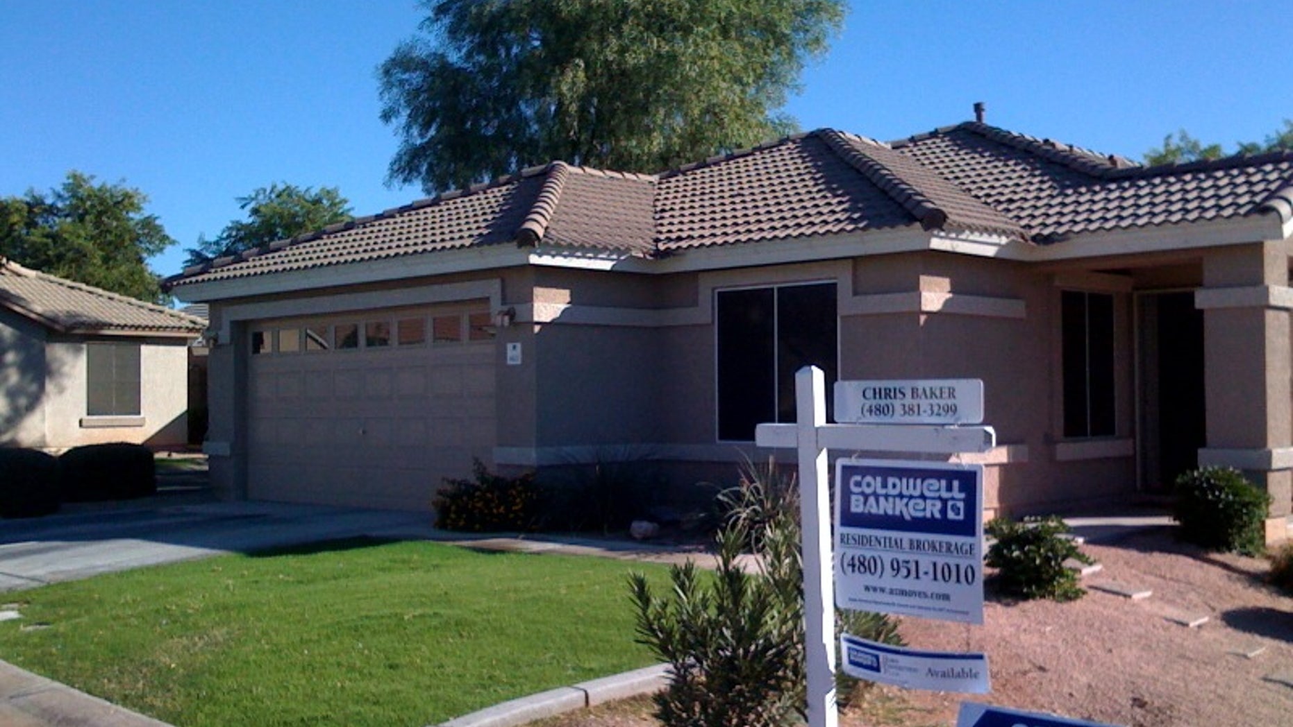 Open house signs in front of house