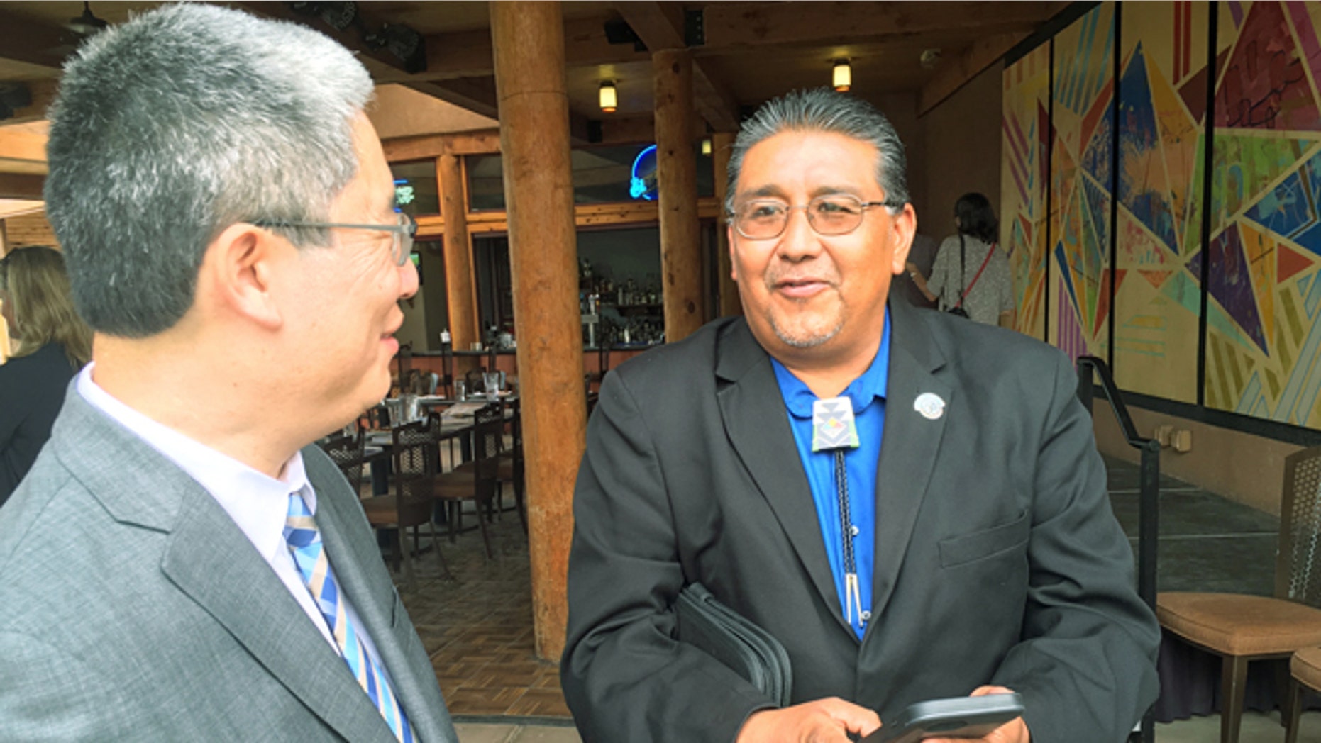 U.S. Associate Deputy Attorney General Bruce Ohris, left, and Santa Clara Pueblo Gov. J. Michael Chavarria.