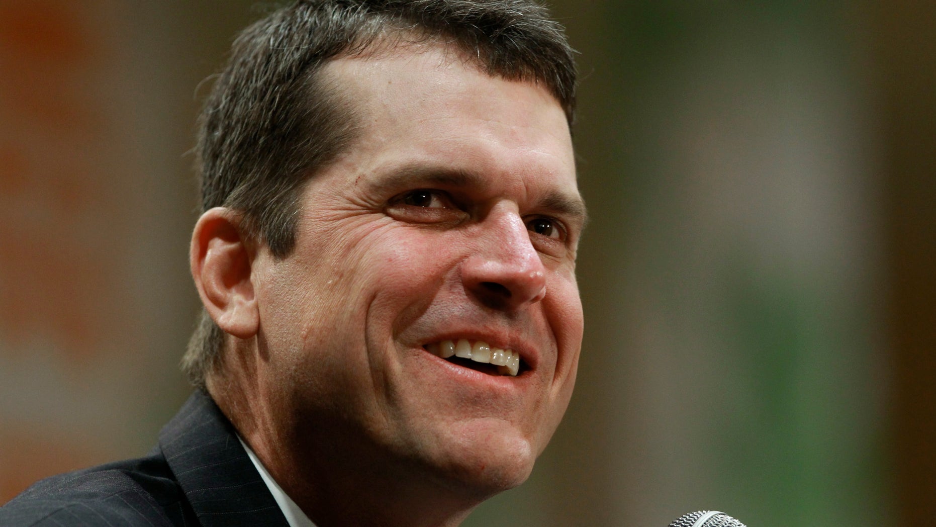 Jan. 3, 2011: Stanford football head coach Jim Harbaugh answers questions during a coach's new conference in Ft. Lauderdale, Fla.