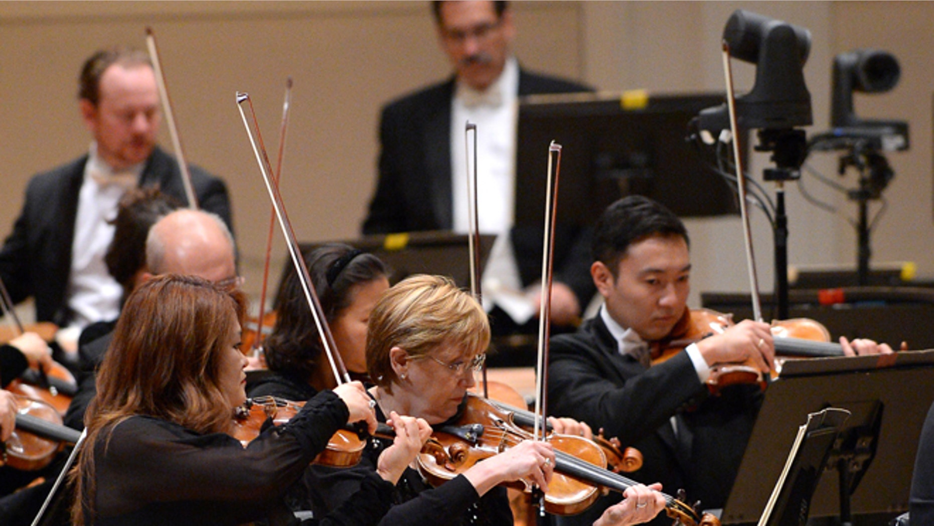 NEW YORK, NY - OCTOBER 07: The New York Philharmonic performs on stage during the Carnegie Hall 125th season opening night gala at Carnegie Hall on October 7, 2015 in New York City. (Photo by Andrew Toth/Getty Images)