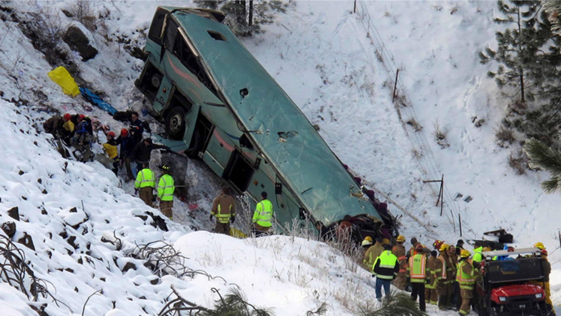 Dec. 30, 2012: Emergency personnel respond to the scene of a multiple-fatality accident after a tour bus careened through a guardrail along an icy highway and fell several hundred feet down a steep embankment, authorities said, about 15 miles east of Pendleton, Ore.