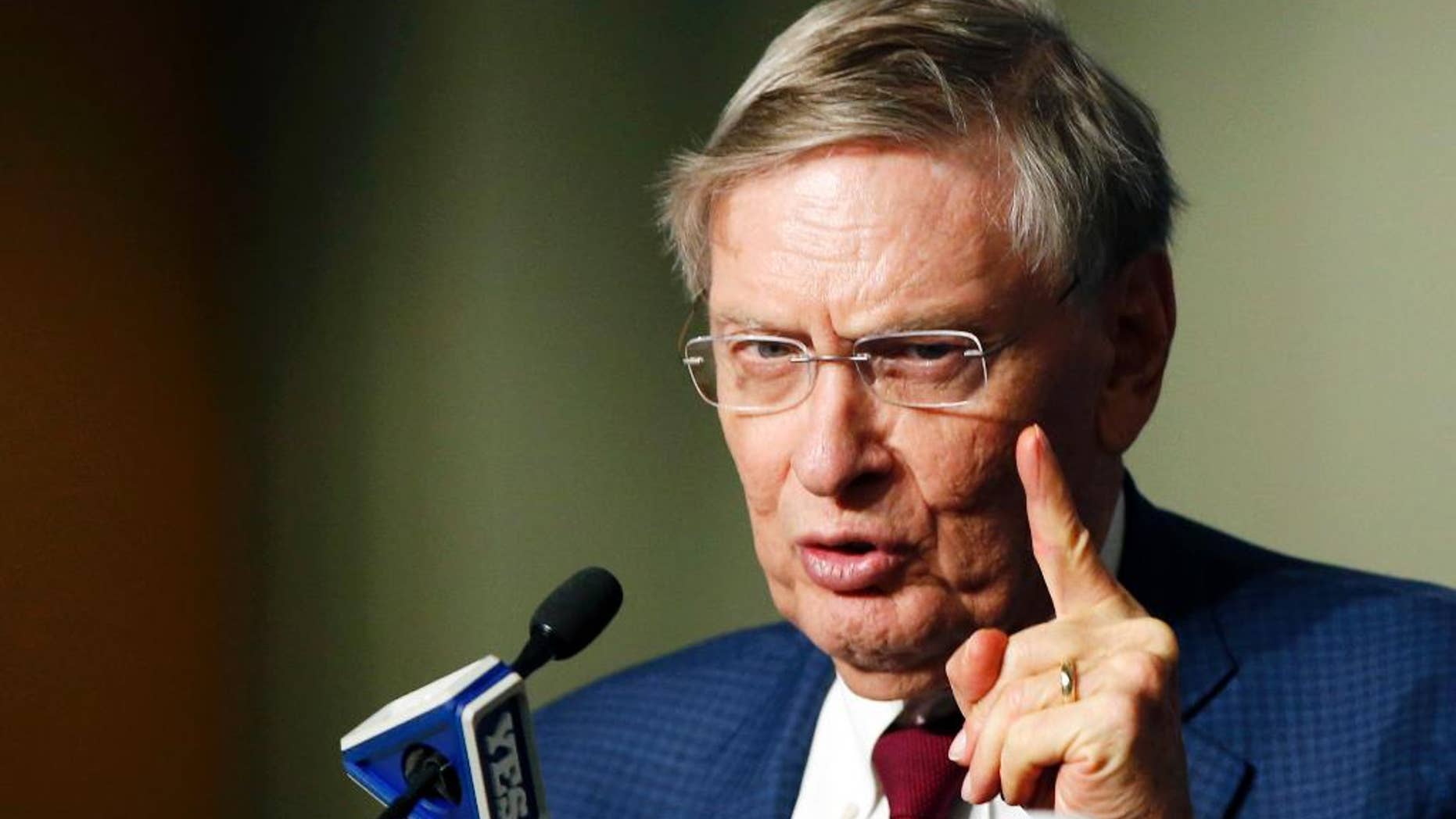 Major League Baseball Commissioner Bud Selig speaks to the media before a baseball game between the New York Yankees and the Baltimore Orioles at Yankee Stadium in New York, Tuesday, Sept. 23, 2014. (AP Photo/Kathy Willens)
