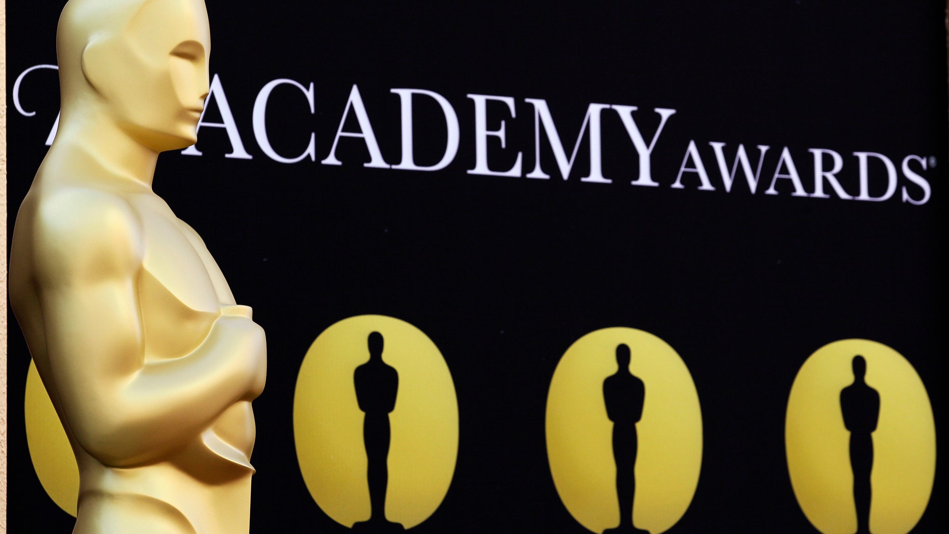 FILE - In this March 5, 2010 file photo, an Oscar statue stands on the red carpet outside the Kodak Theatre as preparations continue for the 82nd Academy Awards in Los Angeles, Calif. The motion picture academy says it's extending the deadline for members to vote for the Academy Awards to Jan. 4, 2013, following criticism of its new electronic voting system. The 85th annual Academy Awards are scheduled for Feb. 24, 2013. (AP Photo/Amy Sancetta, File)