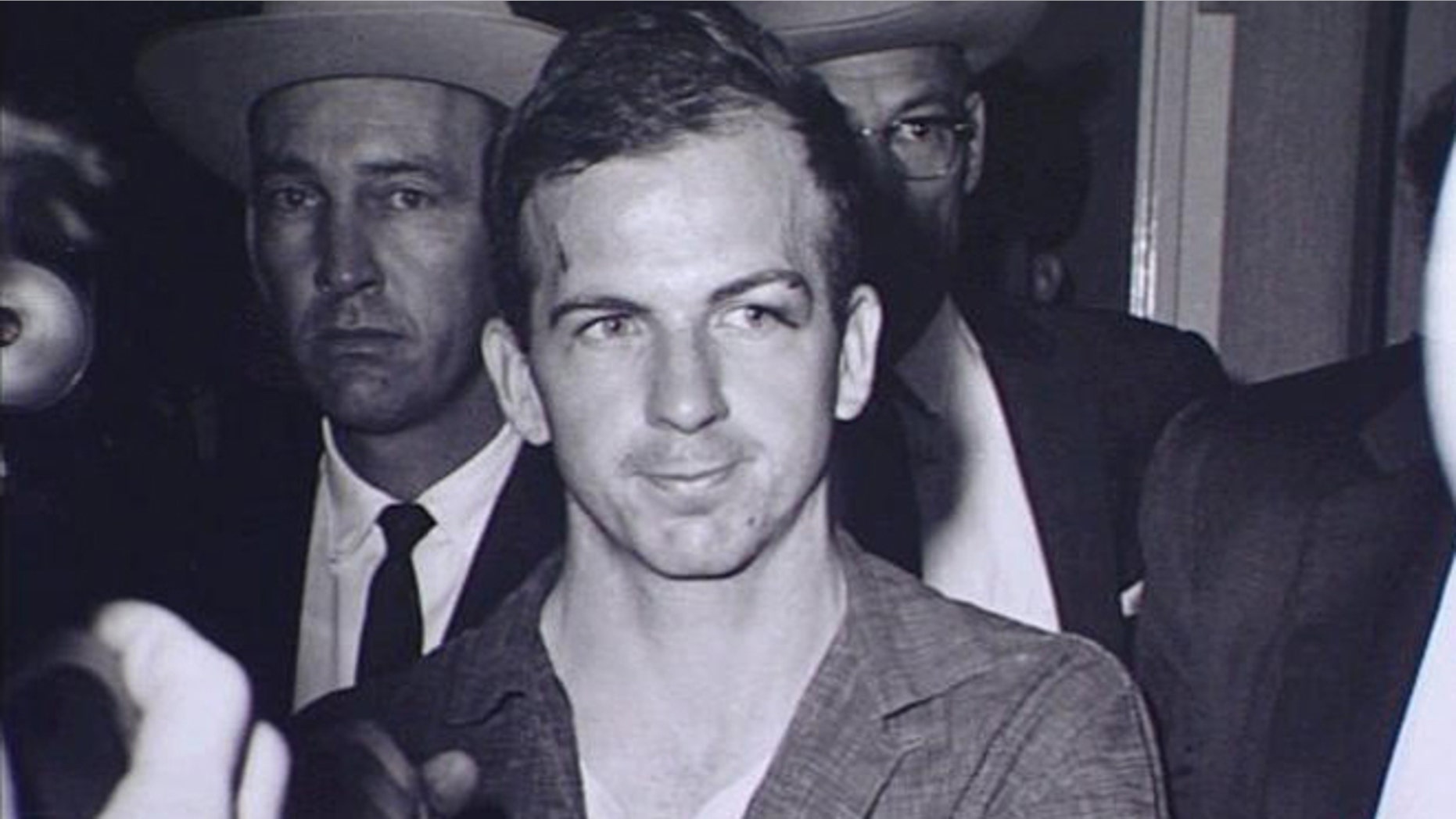 Decades after Kennedy's assassination, many still wonder whether Oswald acted alone or had help.