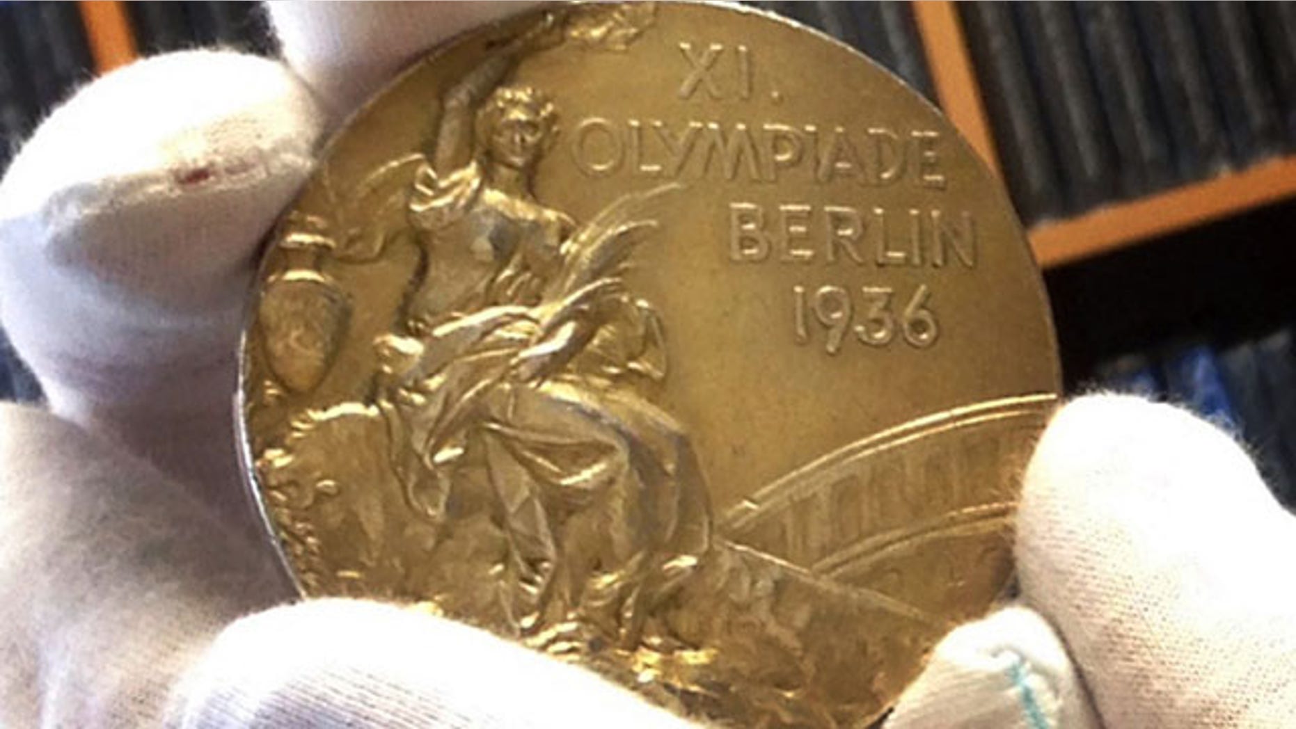 Nov. 19, 2013: Track and field star Jesse Owens' gold medal is displayed from his 1936 Olympics win at the SCP Auctions in Laguna Nigel, Calif.