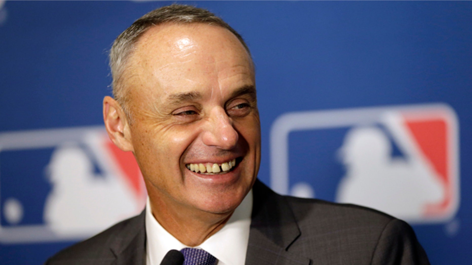 Commissioner of Major League Baseball Rob Manfred speaks during a news conference at a meeting of MLB owners, Thursday, Jan. 21, 2016, in Coral Gables, Fla. Owners held their last meeting before the likely start of collective bargaining, where revenue sharing, the luxury tax, and the international amateur draft are among the topics management may push for change. (AP Photo/Lynne Sladky)