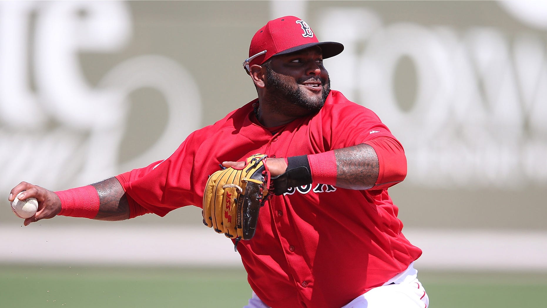 FORT MYERS, - MARCH 14: Pablo Sandoval #48 of the Boston Red Sox makes the throw to first on the ground ball from Jason Rogers (not in photo) of the Pittsburgh Pirates during the fourth inning of the Spring Training Game on March 14, 2016 at Jet Blue Park at Fenway South, Florida. The Pirates defeated the Red Sox 3-1. (Photo by Leon Halip/Getty Images)