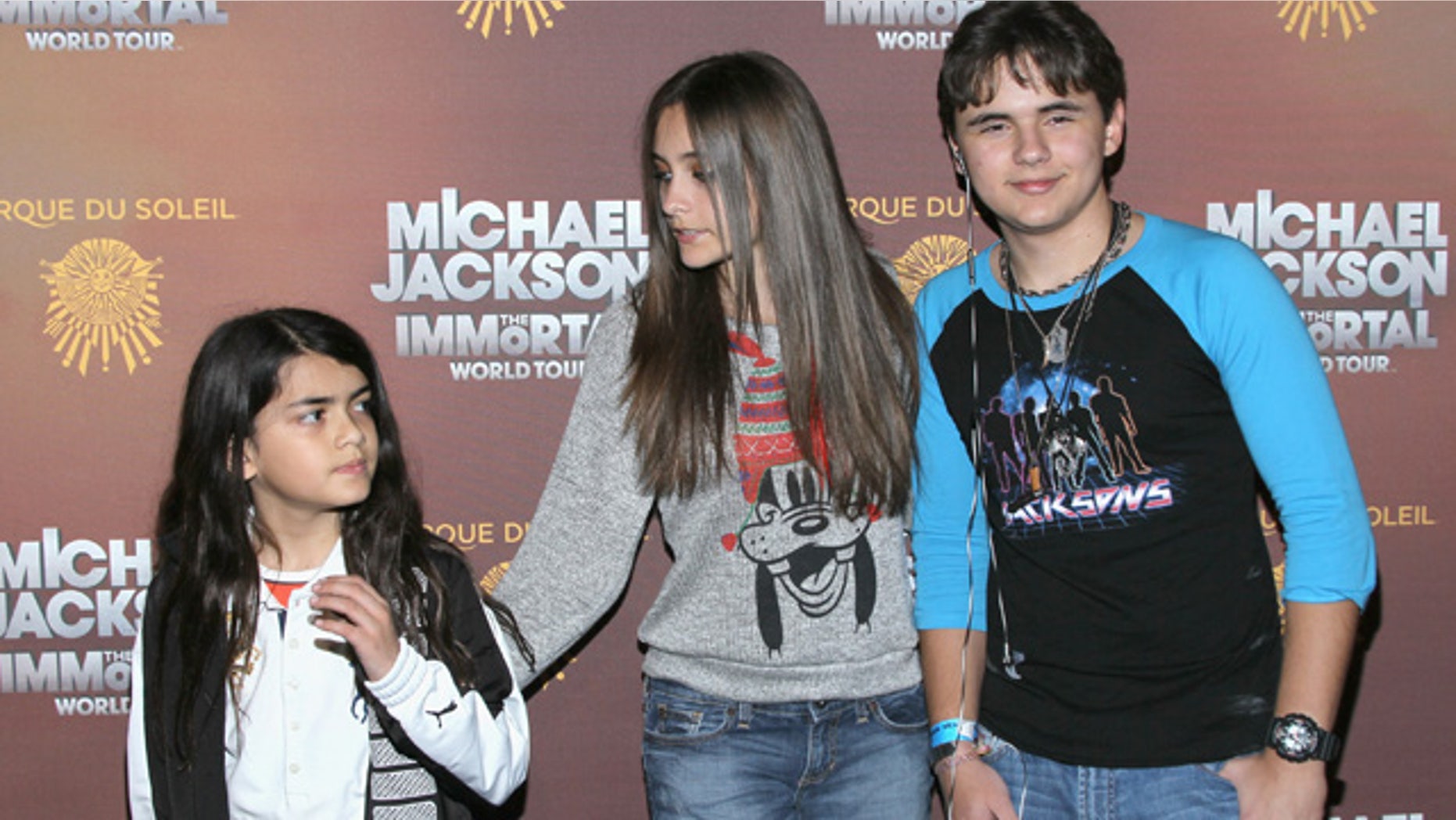 LOS ANGELES, CA - JANUARY 27: (L-R) Blanket Jackson, Paris Jackson and Prince Jackson attend the Los Angeles premiere of Michael Jackson 'THE IMMORTAL' World Tour at Staples Center on January 27, 2012 in Los Angeles, California. (Photo by Mark Davis/Getty Images)