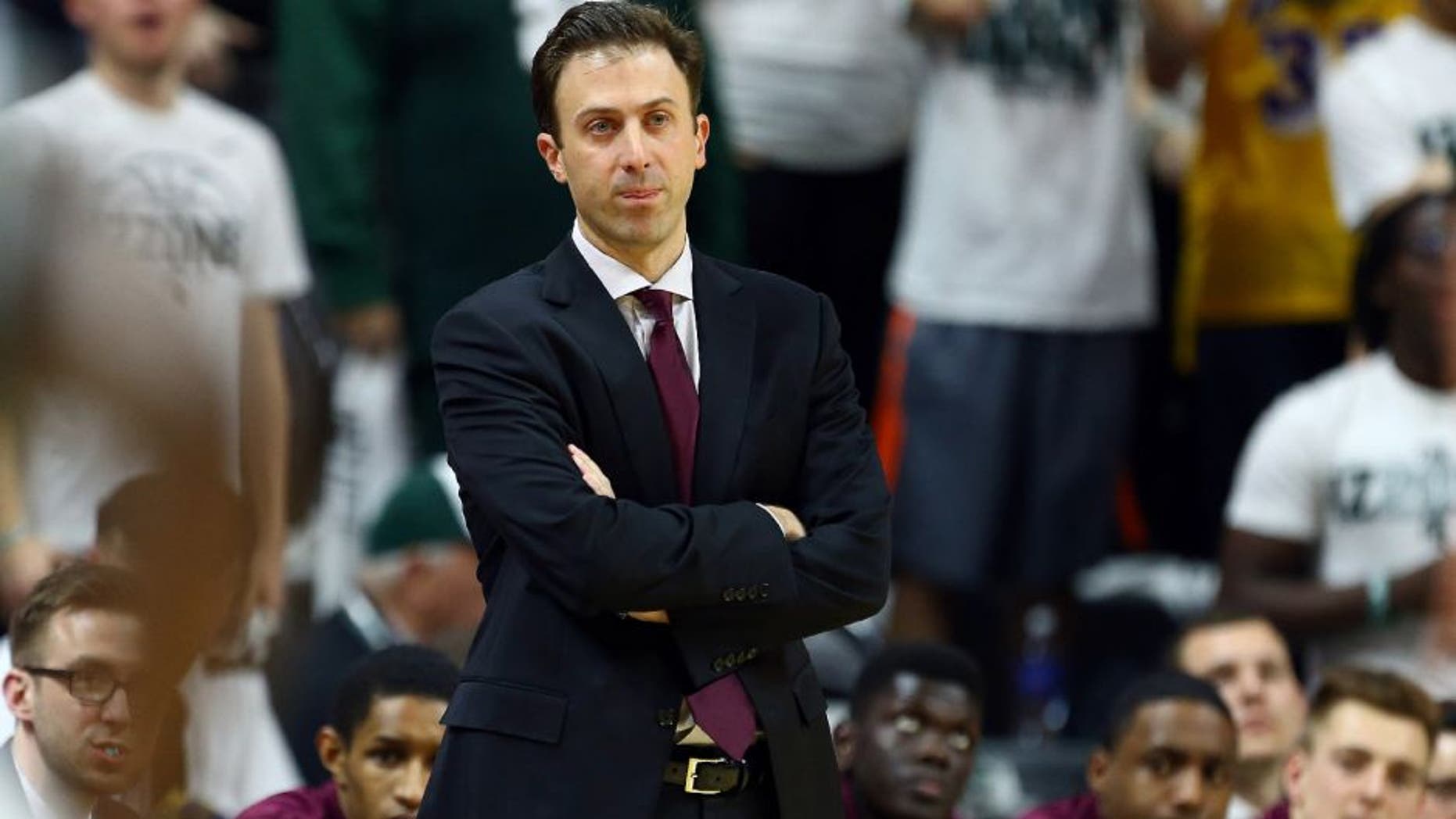 Feb 26, 2015; East Lansing, MI, USA; Minnesota Golden Gophers head coach Richard Pitino reacts to a play during the 1st half of a game at Jack Breslin Student Events Center.