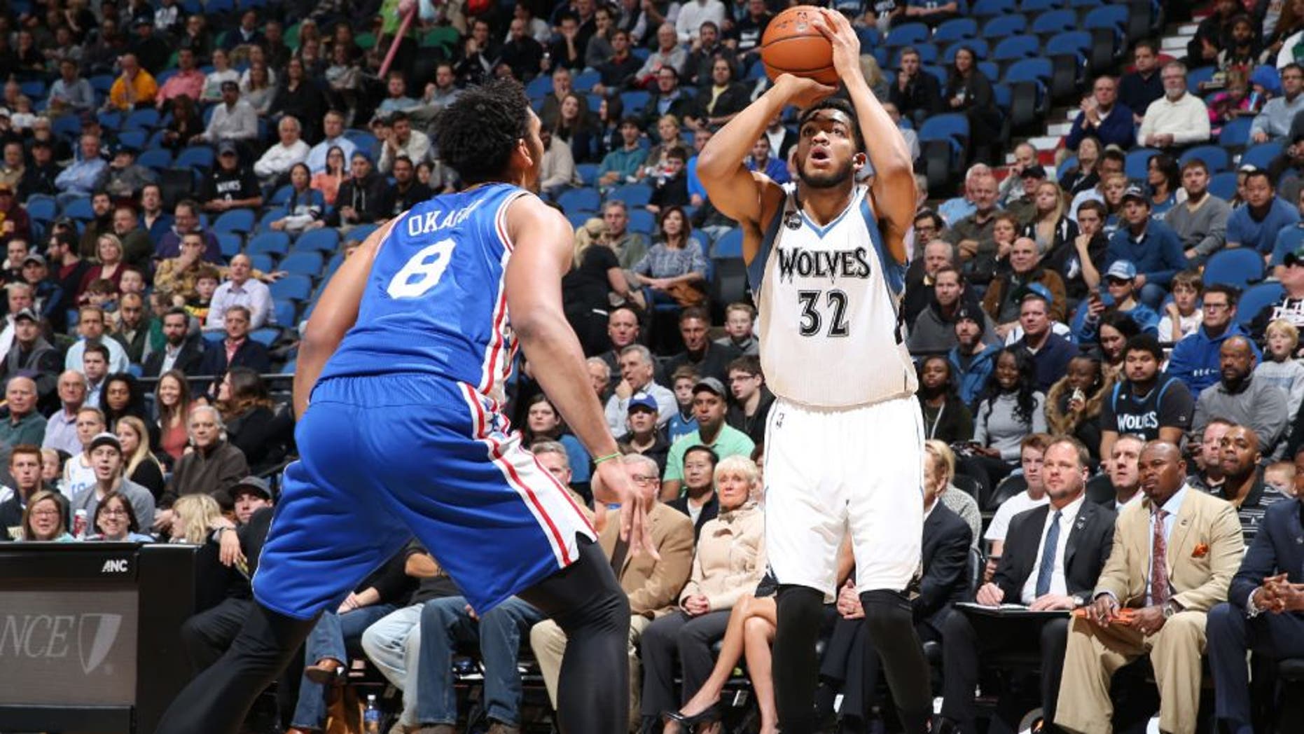 MINNEAPOLIS, MN - NOVEMBER 23: Karl-Anthony Towns #32 of the Minnesota Timberwolves shoots against the Philadelphia 76ers during the game on November 23, 2015 at Target Center in Minneapolis.