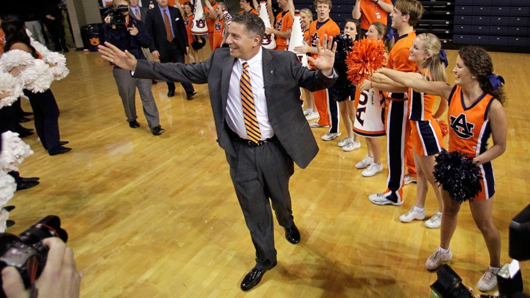 Mar 18, 2014; Auburn, AL, USA; Auburn Tigers basketball coach Bruce Pearl is welcomed by the crowd prior to his introductory press conference in the Auburn Arena on Tuesday. Mandatory Credit: John Reed-USA TODAY Sports