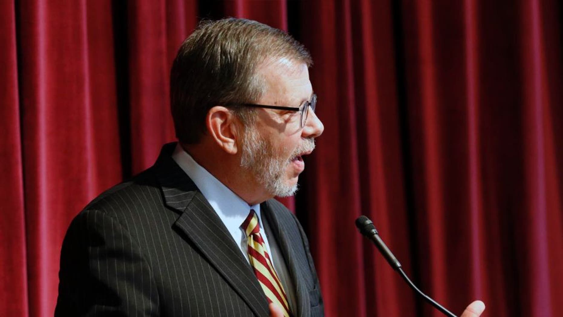 University of Minnesota President Eric Kaler addresses questions after he announced the resignation of athletic director Norwood Teague, Friday, Aug. 7, 2015 in Minneapolis.