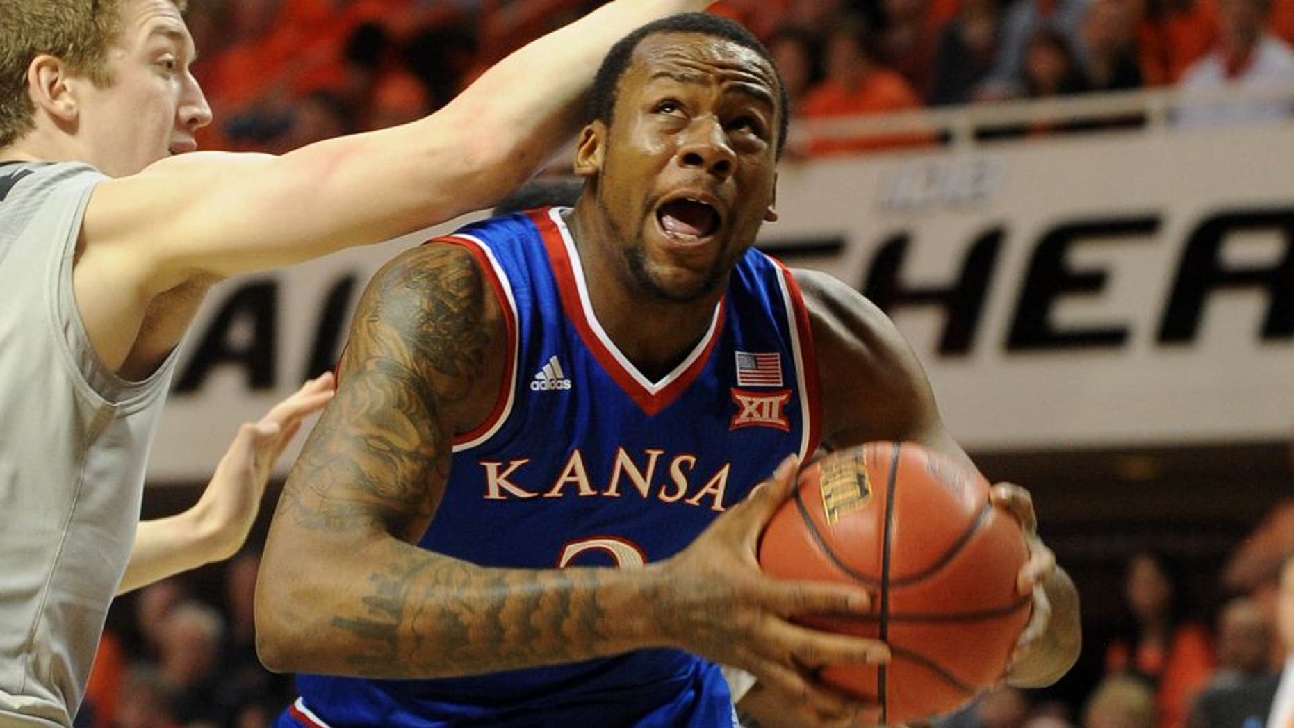 Feb 7, 2015; Stillwater, OK, USA; Kansas Jayhawks forward Cliff Alexander (2) attempts a shot against Oklahoma State Cowboys forward/center Mitchell Solomon (41) during the first half at Gallagher-Iba Arena. Mandatory Credit: Mark D. Smith-USA TODAY Sports