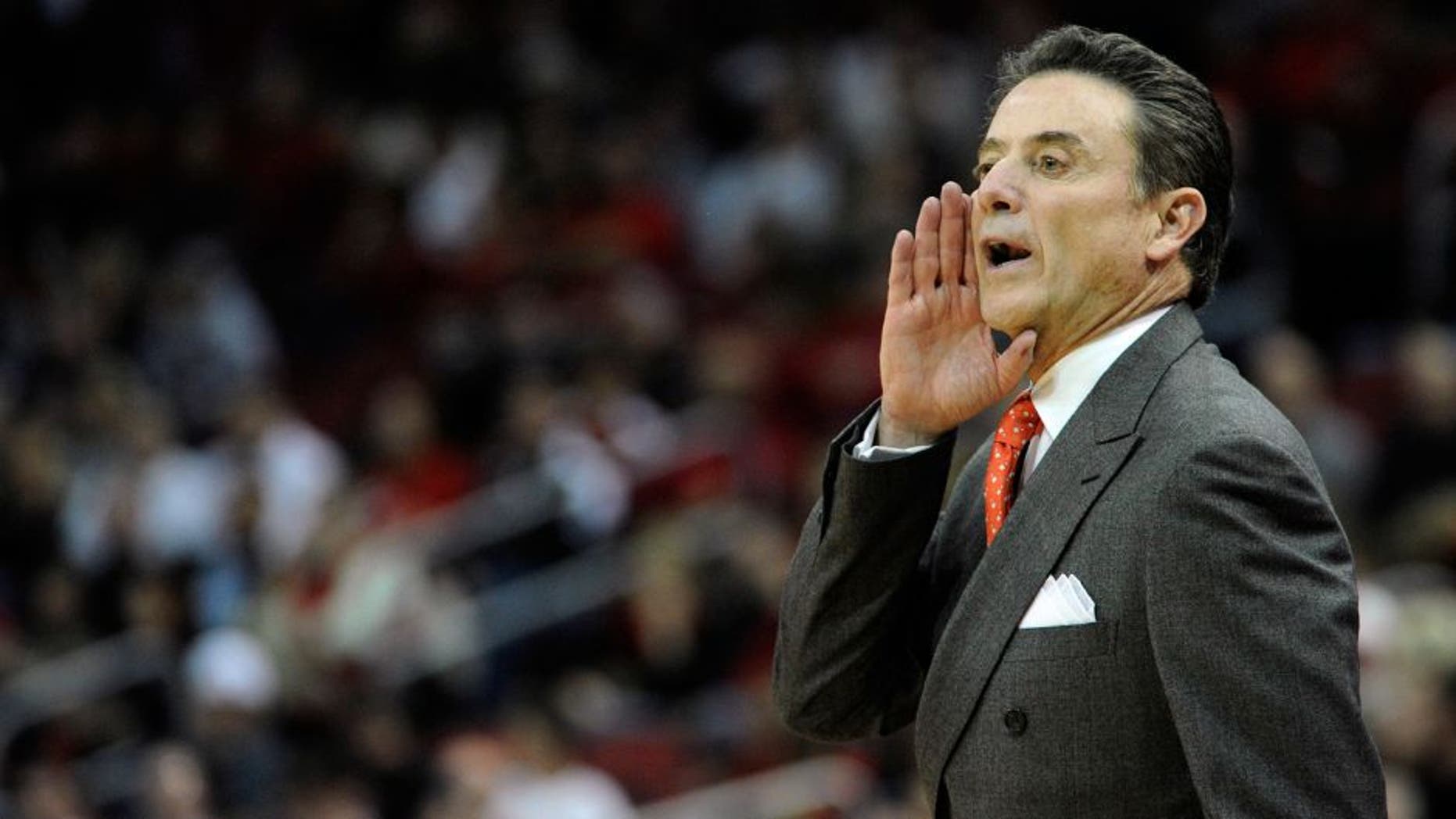 Nov 24, 2014; Louisville, KY, USA; Louisville Cardinals head coach Rick Pitino calls out instructions during the first half against the Savannah State Tigers at KFC Yum! Center. Mandatory Credit: Jamie Rhodes-USA TODAY Sports
