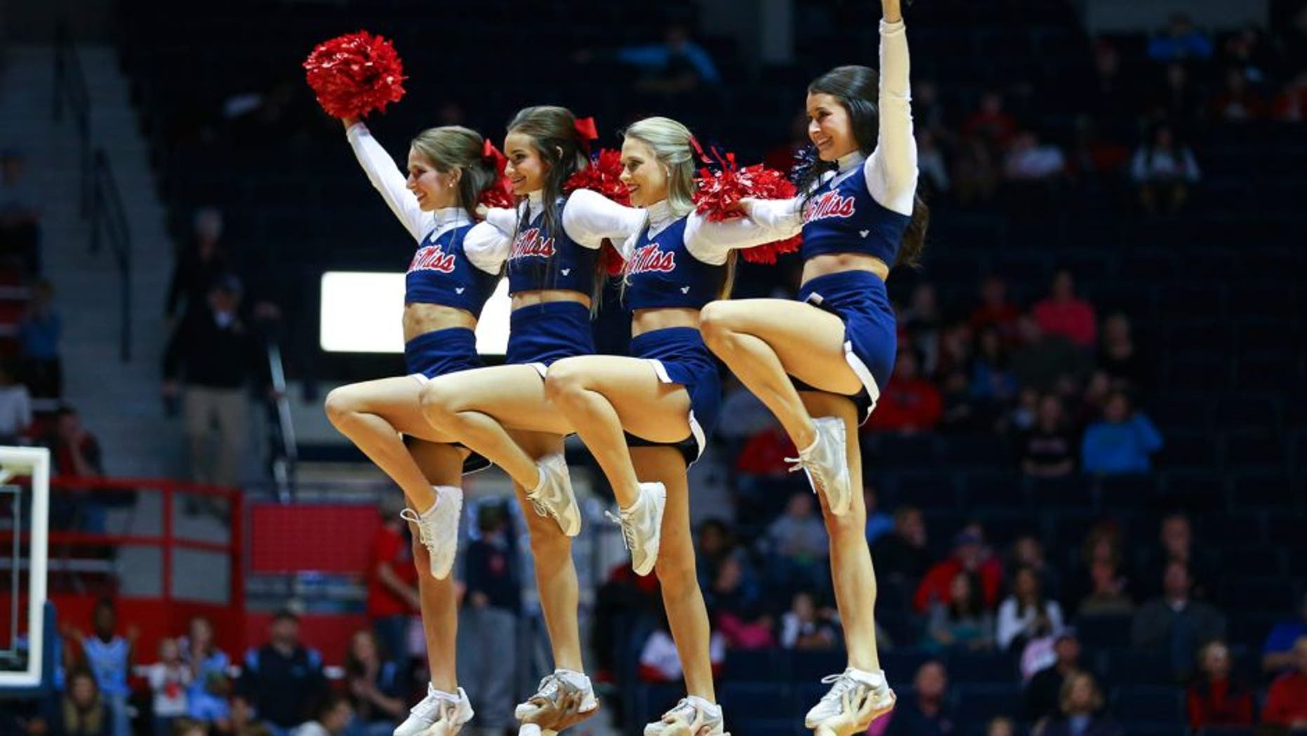Jan 3, 2015; Oxford, MS, USA; Mississippi Rebels cheerleaders entertain the crowd during the game against the Austin Peay Governors at C.M. Tad Smith Coliseum. Mississippi Rebels defeat the Austin Peay Governors 92-63. Mandatory Credit: Spruce Derden-USA TODAY Sports