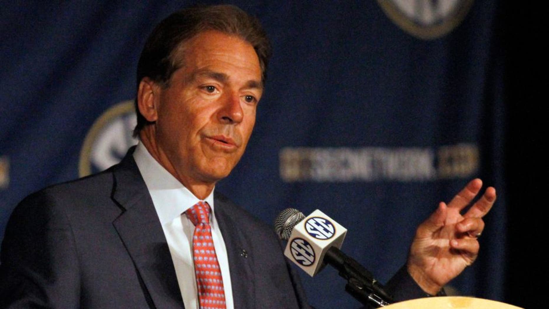 Alabama coach Nick Saban speaks to the media at the Southeastern Conference NCAA college football media days Thursday, July 17, 2014, in Hoover, Ala. (AP Photo/Butch Dill)
