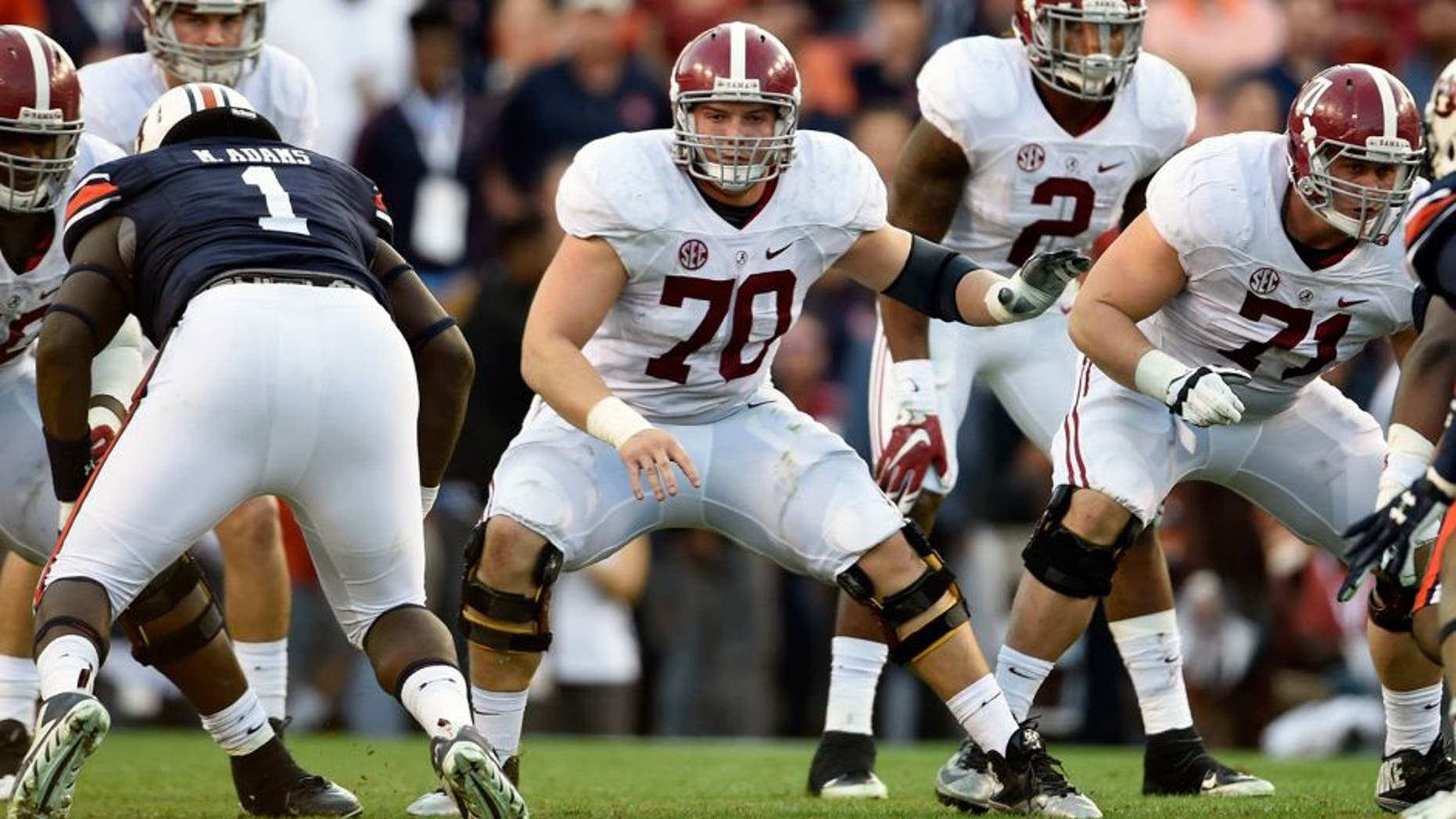 Nov 28, 2015; Auburn, AL, USA; Alabama Crimson Tide offensive lineman Ryan Kelly (70) sets to pass block against the Auburn Tigers at Jordan Hare Stadium. Mandatory Credit: RVR Photos-USA TODAY Sports
