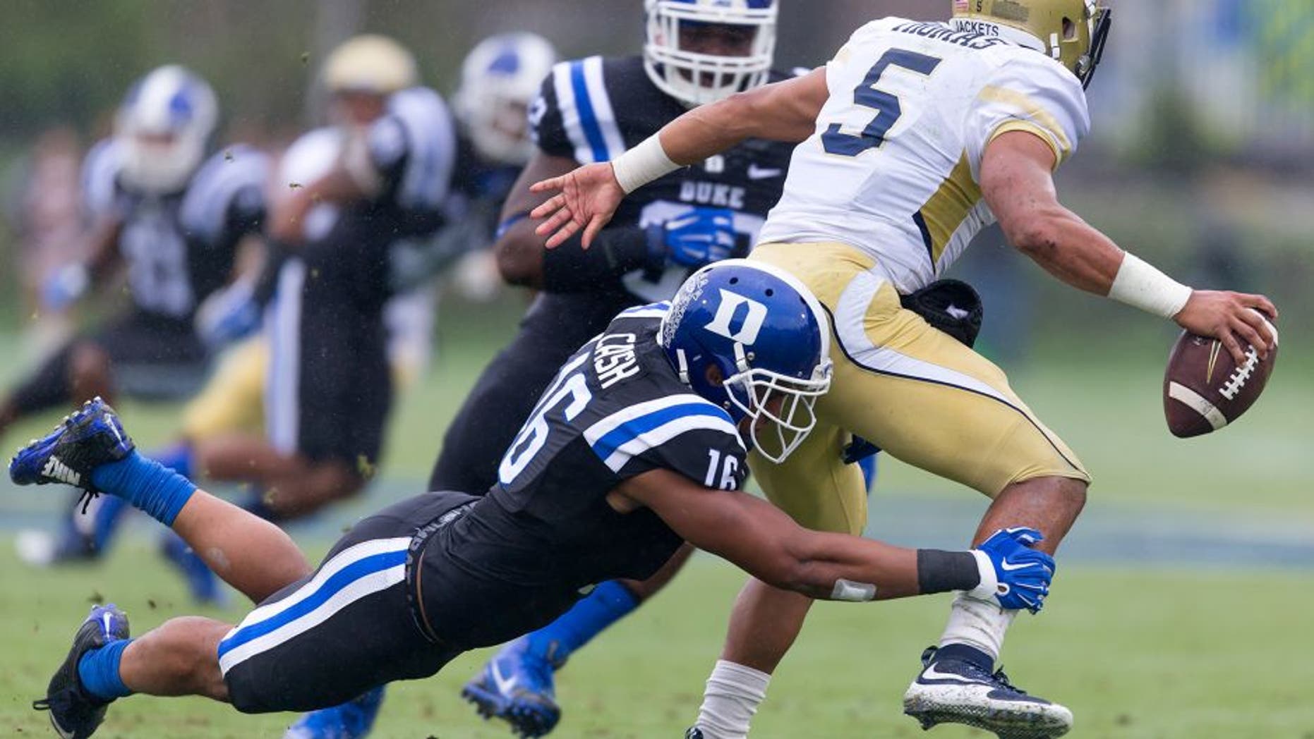 FILE - In this Sept. 26, 2015, file photo, Duke's Jeremy Cash tackles Georgia Tech's Justin Thomas for a loss during the first half of an NCAA college football game, in Durham, N.C. Georgia Tech fell out of the Top 25 with its loss to Duke. (AP Photo/Rob Brown)