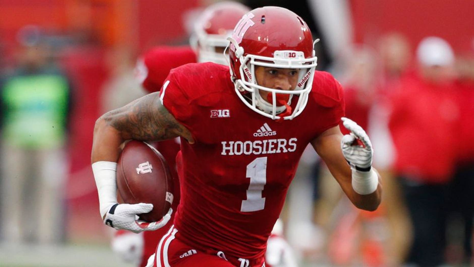 Oct 3, 2015; Bloomington, IN, USA; Indiana Hoosiers wide receiver Simmie Cobbs Jr. (1) runs with the ball after making a catch against the Ohio State Buckeyes at Memorial Stadium. Ohio State defeats Indiana 34-27. Mandatory Credit: Brian Spurlock-USA TODAY Sports