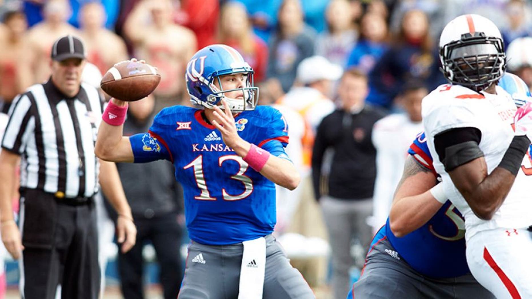 Oct 17, 2015; Lawrence, KS, USA; DUPLICATE Kansas Jayhawks quarterback Ryan Willis (13) throws the ball down the field against Texas Tech at Memorial Stadium. Mandatory Credit: Gary Rohman/MLS/USA TODAY Sports
