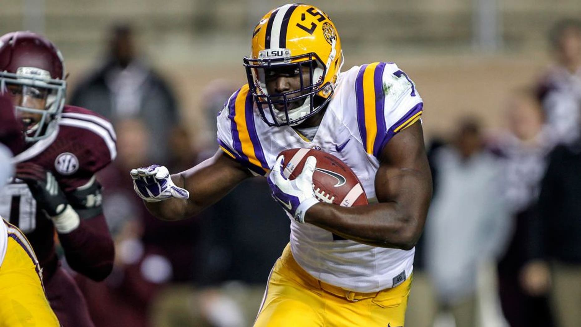 Nov 27, 2014; College Station, TX, USA; LSU Tigers running back Leonard Fournette (7) rushes during the second quarter against the Texas A&M Aggies at Kyle Field. Mandatory Credit: Troy Taormina-USA TODAY Sports