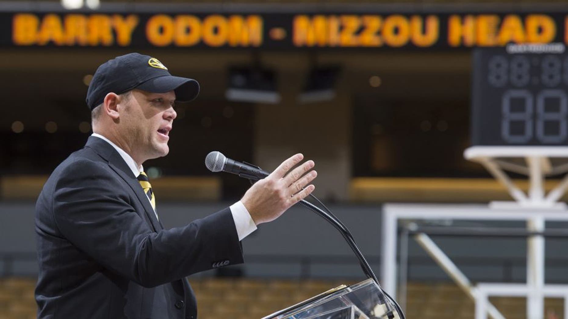 Barry Odom talks to a crowd gathered at Mizzou Arena as he is announced as the new head coach for the NCAA college Missouri football team Friday, Dec. 4, 2015, in Columbia, Mo. (AP Photo/L.G. Patterson)