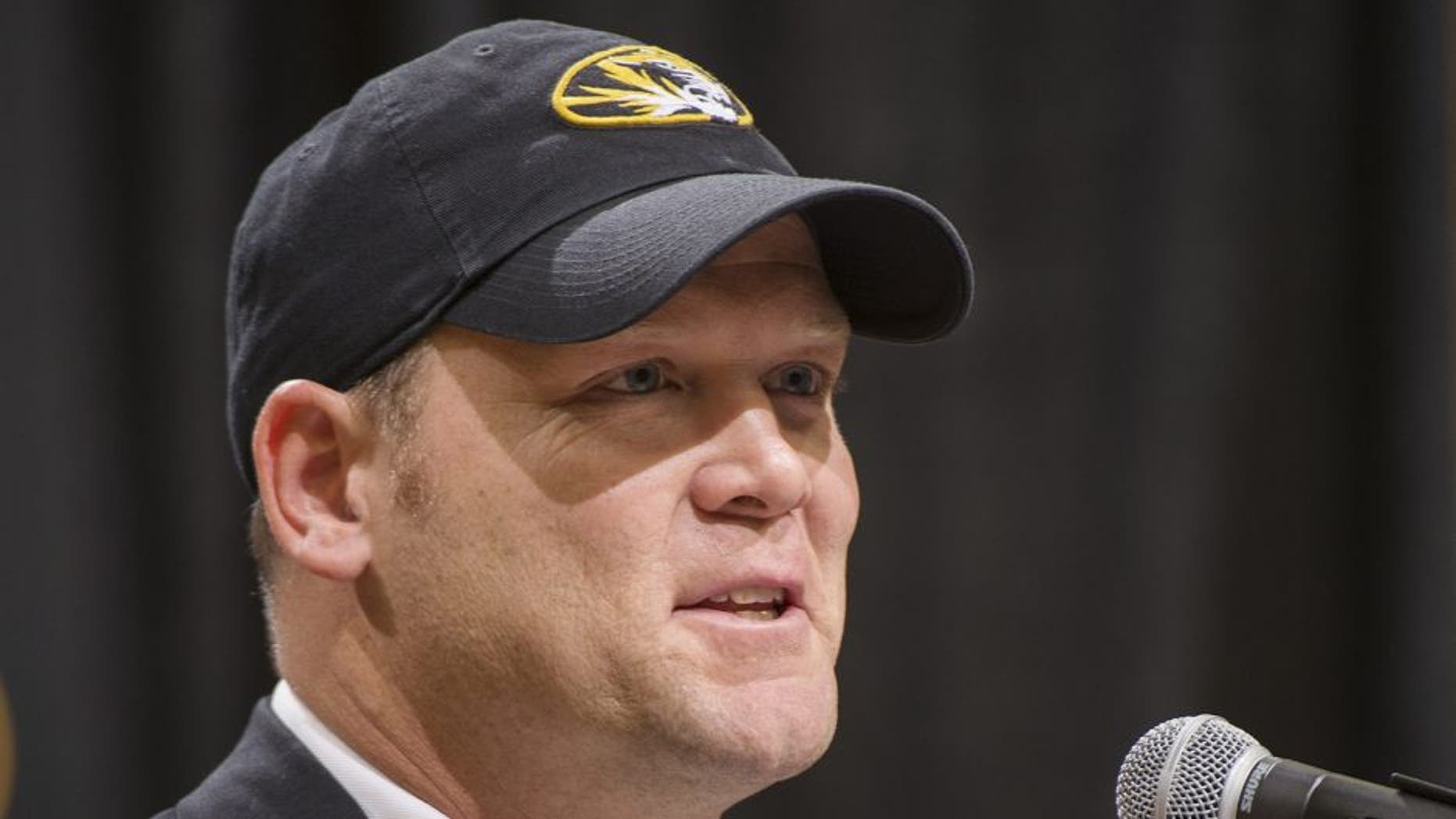 Barry Odom talks to a crowd gathered at Mizzou Arena as he is announced as the new head coach for the Missouri NCAA college football team Friday, Dec. 4, 2015, in Columbia, Mo. (AP Photo/L.G. Patterson)