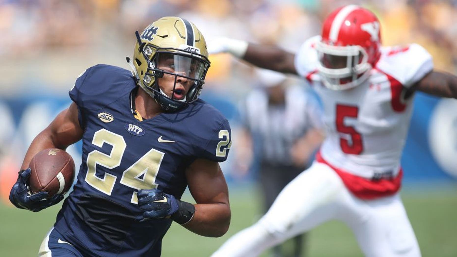 Sep 5, 2015; Pittsburgh, PA, USA; Pittsburgh Panthers running back James Conner (24) carries the ball against the Youngstown State Penguins during the first half at Heinz Field. Mandatory Credit: Charles LeClaire-USA TODAY Sports