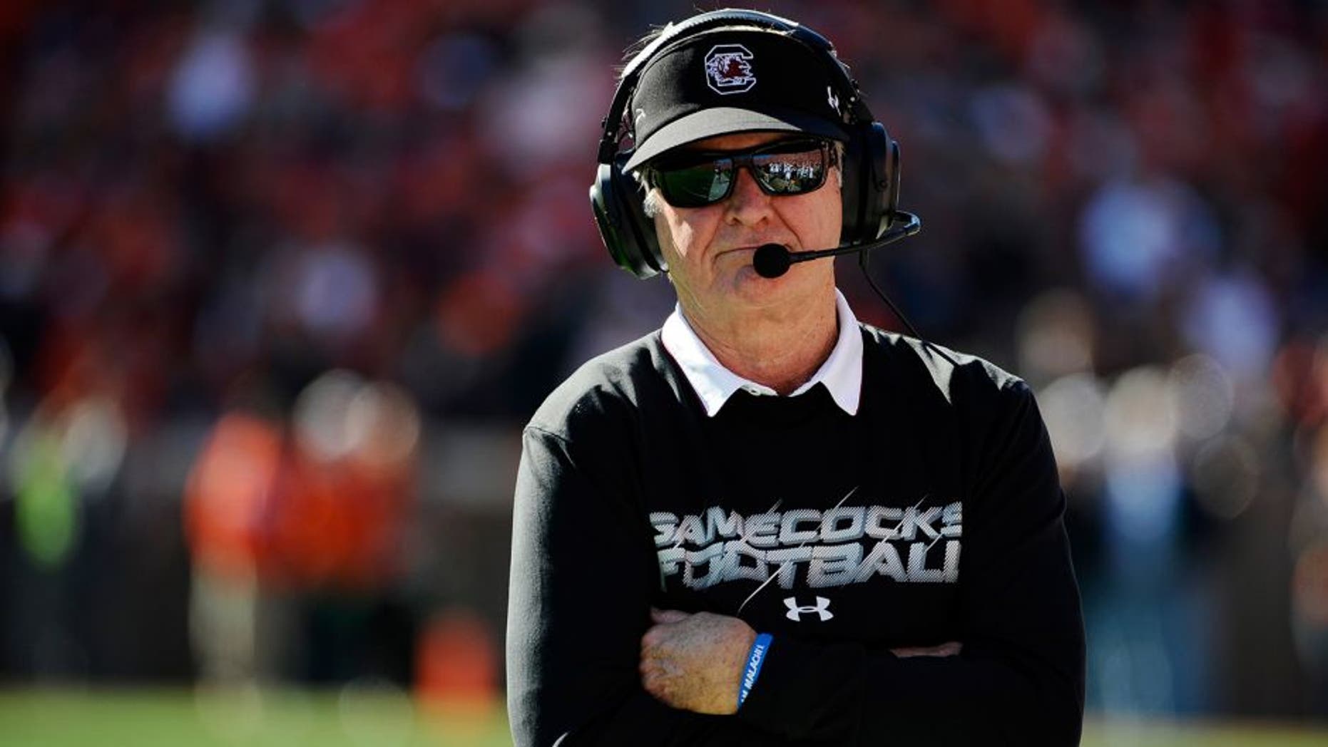 South Carolina head coach Steve Spurrier looks on from the sideline during the first half of an NCAA college football game against Clemson, Saturday, Nov. 29, 2014, in Clemson, S.C. (AP Photo/Rainier Ehrhardt)