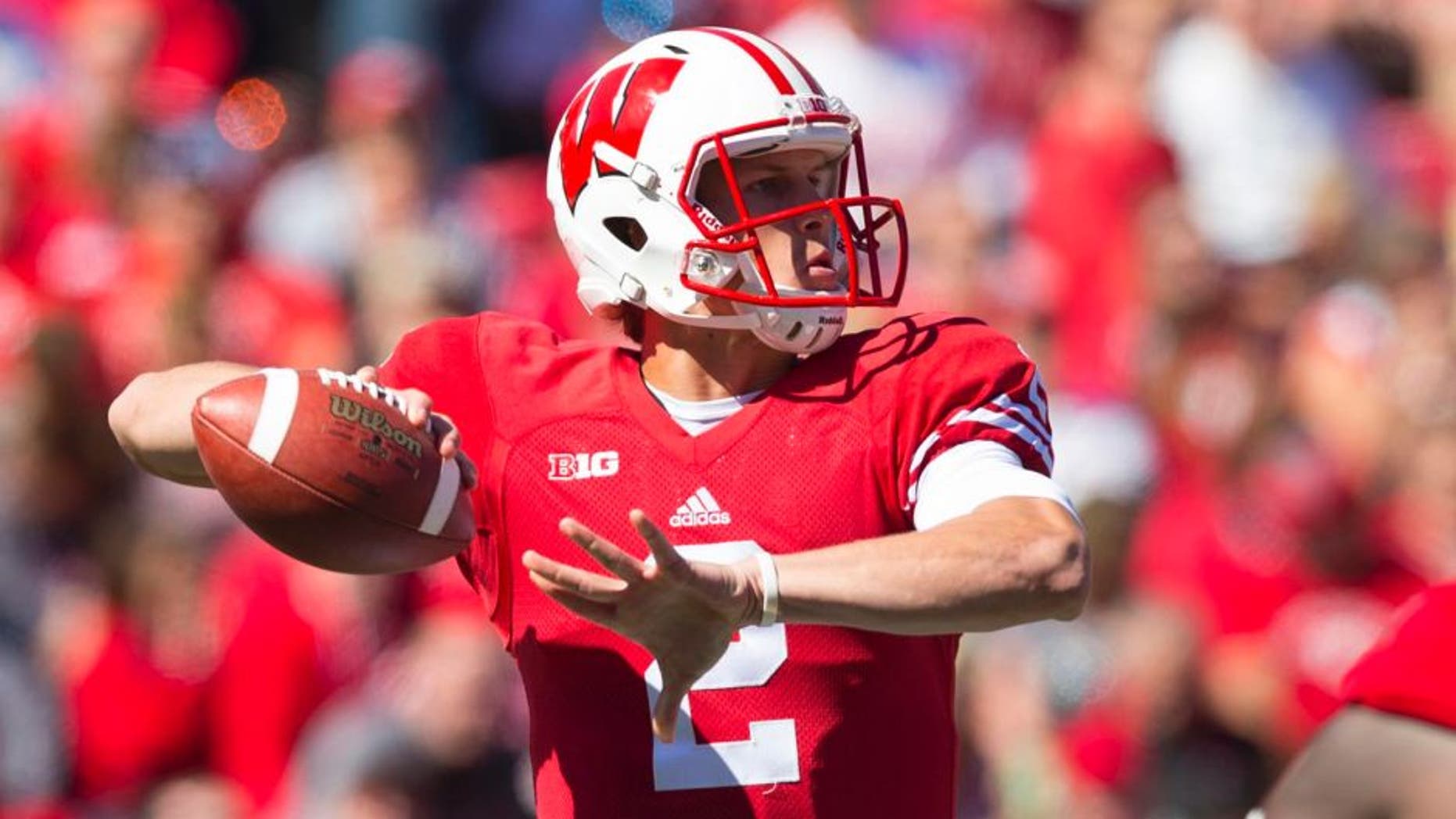 Wisconsin Badgers quarterback Joel Stave throws a pass during the first quarter against the Miami (Ohio) RedHawks at Camp Randall Stadium in Madison, Wis., on Saturday, Sept. 12, 2015.
