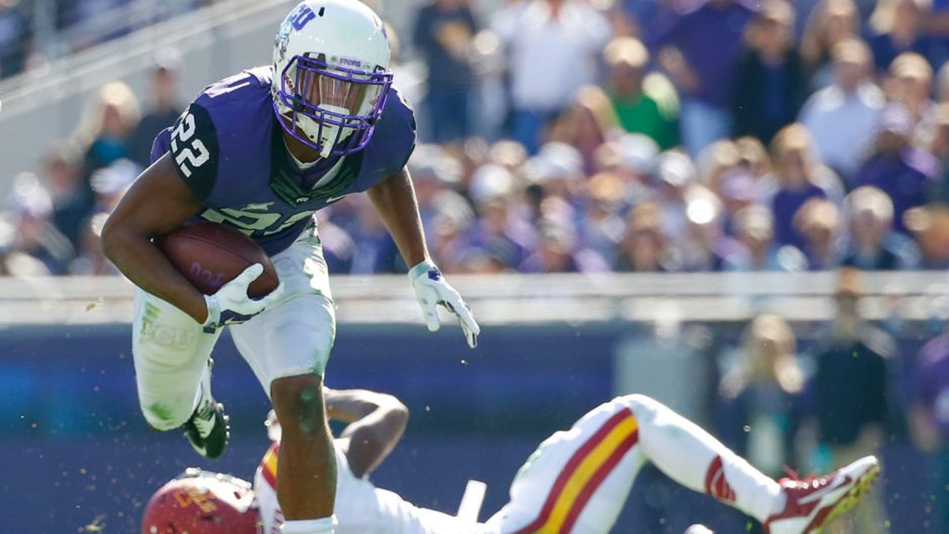 Dec 6, 2014; Fort Worth, TX, USA; TCU Horned Frogs running back Aaron Green (22) runs during the first half against the Iowa State Cyclones at Amon G. Carter Stadium. Mandatory Credit: Kevin Jairaj-USA TODAY Sports