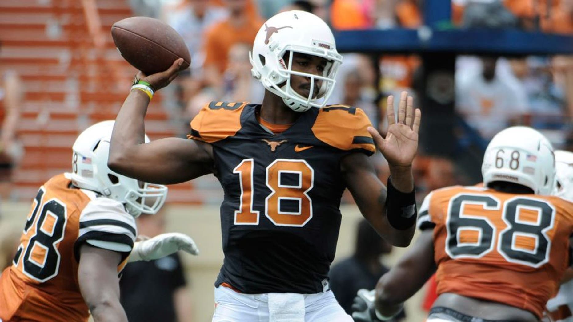 Apr 19, 2014; Austin, TX, USA; Texas Longhorns quarterback Tyrone Swoopes (18) passes the ball during the Spring Game at Texas Memorial Stadium. Mandatory Credit: Brendan Maloney-USA TODAY Sports