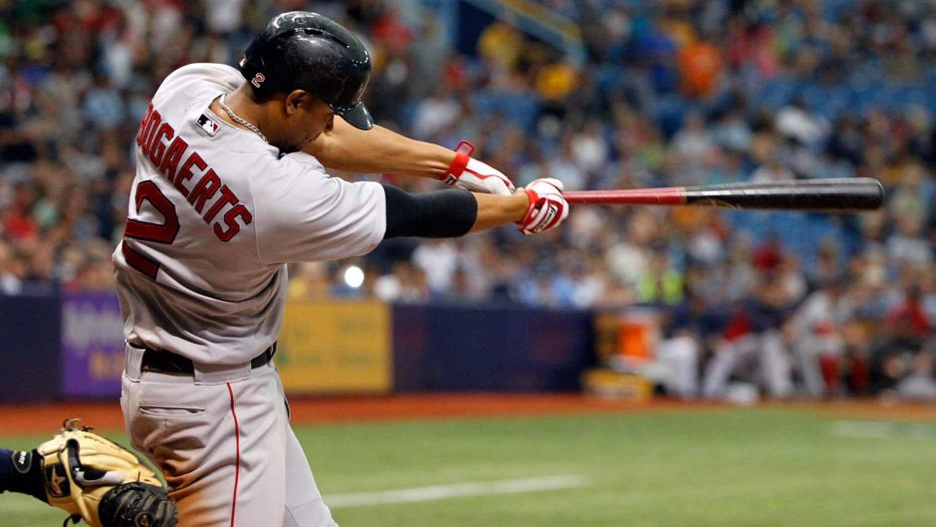 May 25, 2014; St. Petersburg, FL, USA; Boston Red Sox shortstop Xander Bogaerts (2) hits a 2-RBI single during the ninth inning against the Tampa Bay Rays at Tropicana Field. Tampa Bay Rays defeated the Boston Red Sox 8-5. Mandatory Credit: Kim Klement-USA TODAY Sports