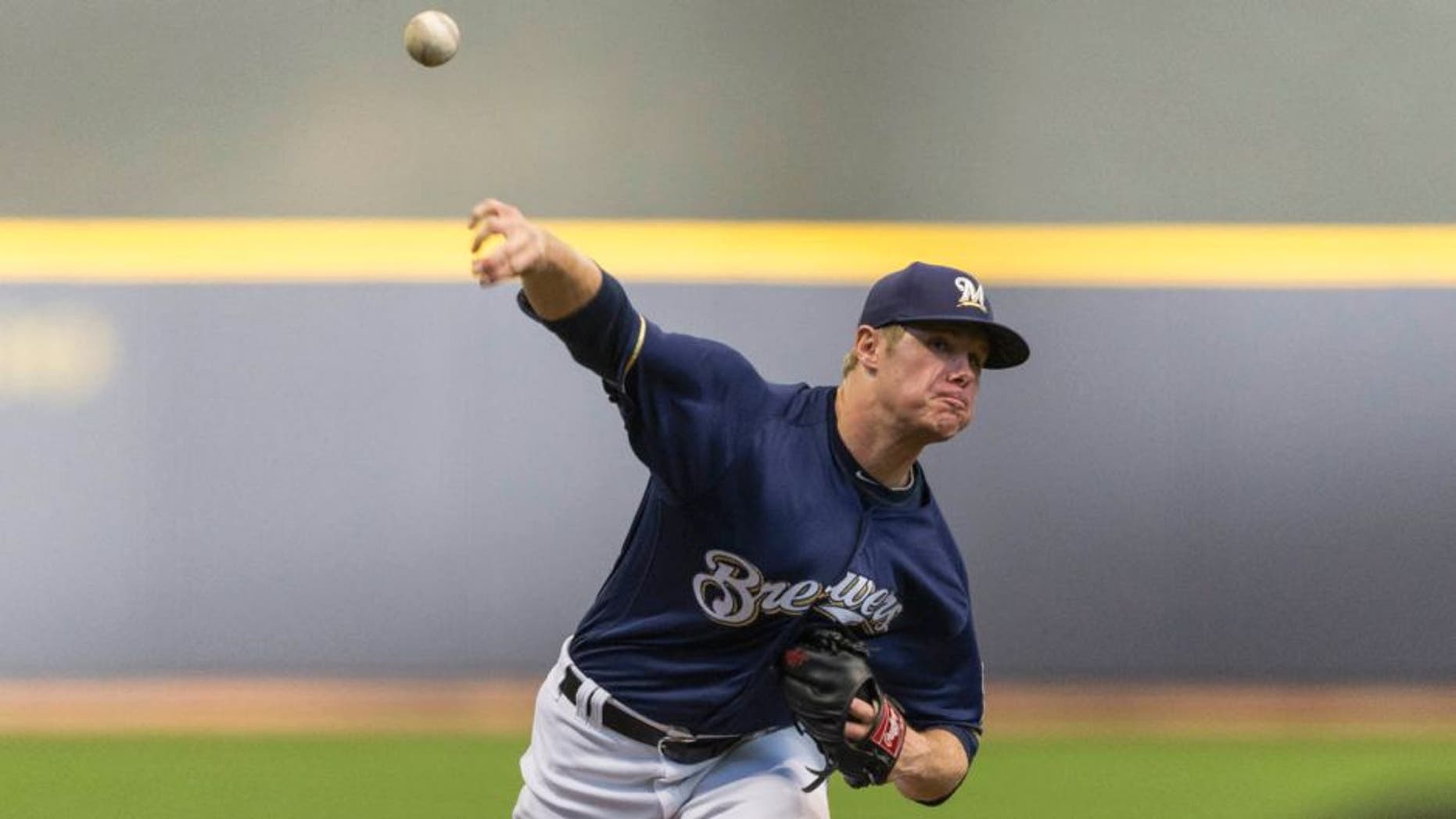 The Milwaukee Brewers' Chase Anderson pitches to a Philadelphia Phillies batter during the first inning Saturday, April 23, 2016, in Milwaukee.