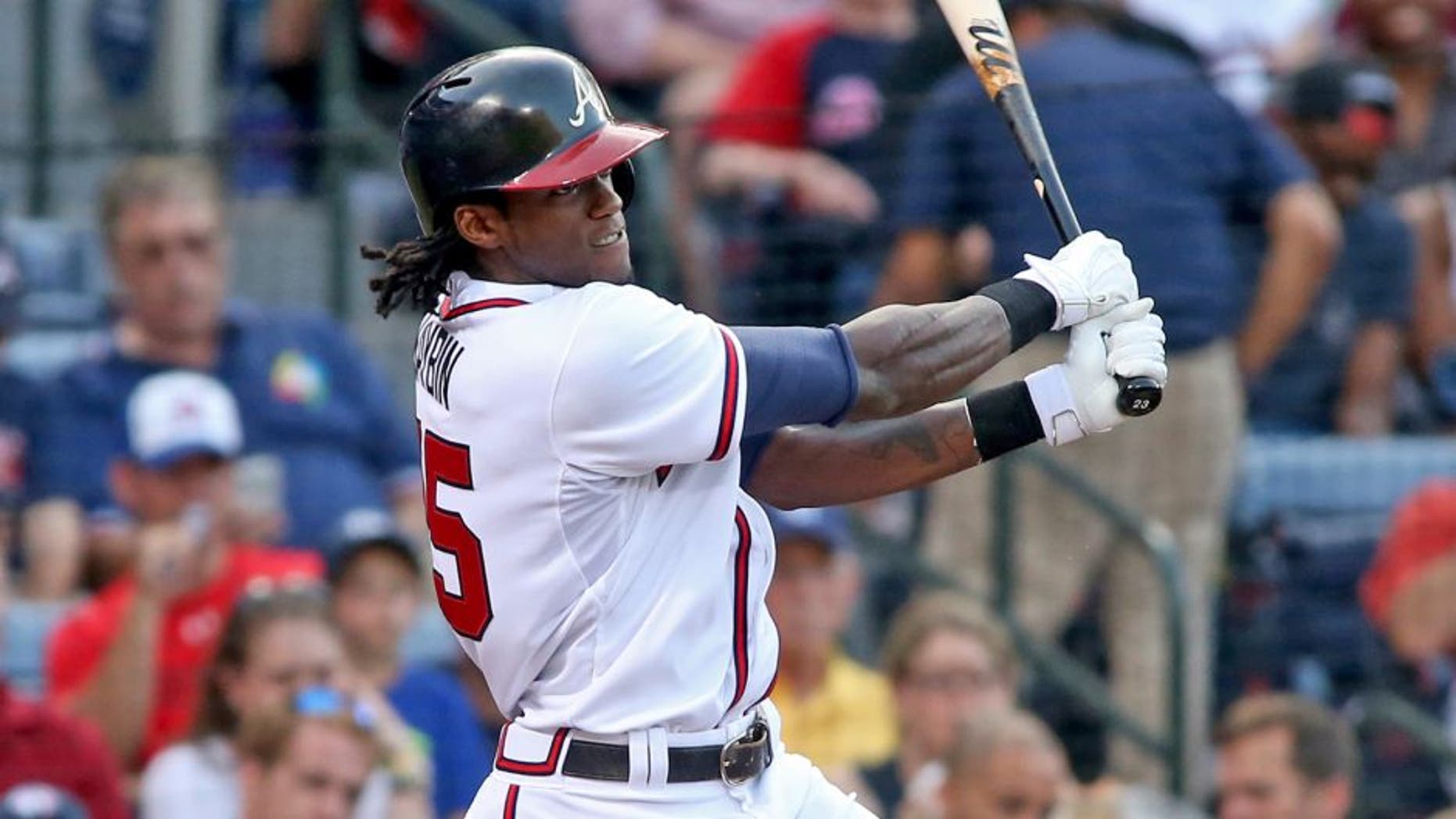 May 19, 2015; Atlanta, GA, USA; Atlanta Braves Cameron Maybin (25) hits an RBI single in the second inning of their game against the Tampa Bay Rays at Turner Field. Mandatory Credit: Jason Getz-USA TODAY Sports