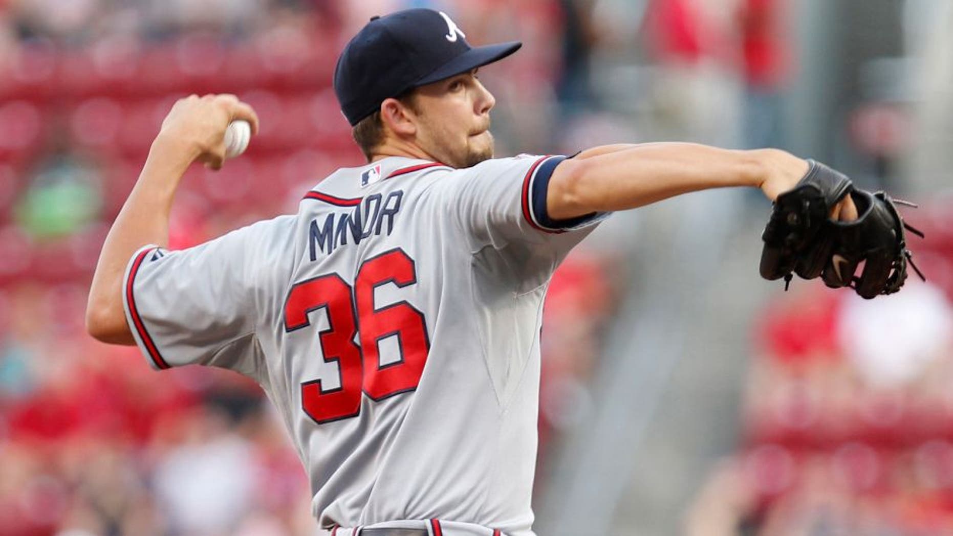 Aug 22, 2014; Cincinnati, OH, USA; Atlanta Braves starting pitcher Mike Minor (36) pitches during the first inning against the Cincinnati Reds at Great American Ball Park. Mandatory Credit: Frank Victores-USA TODAY Sports