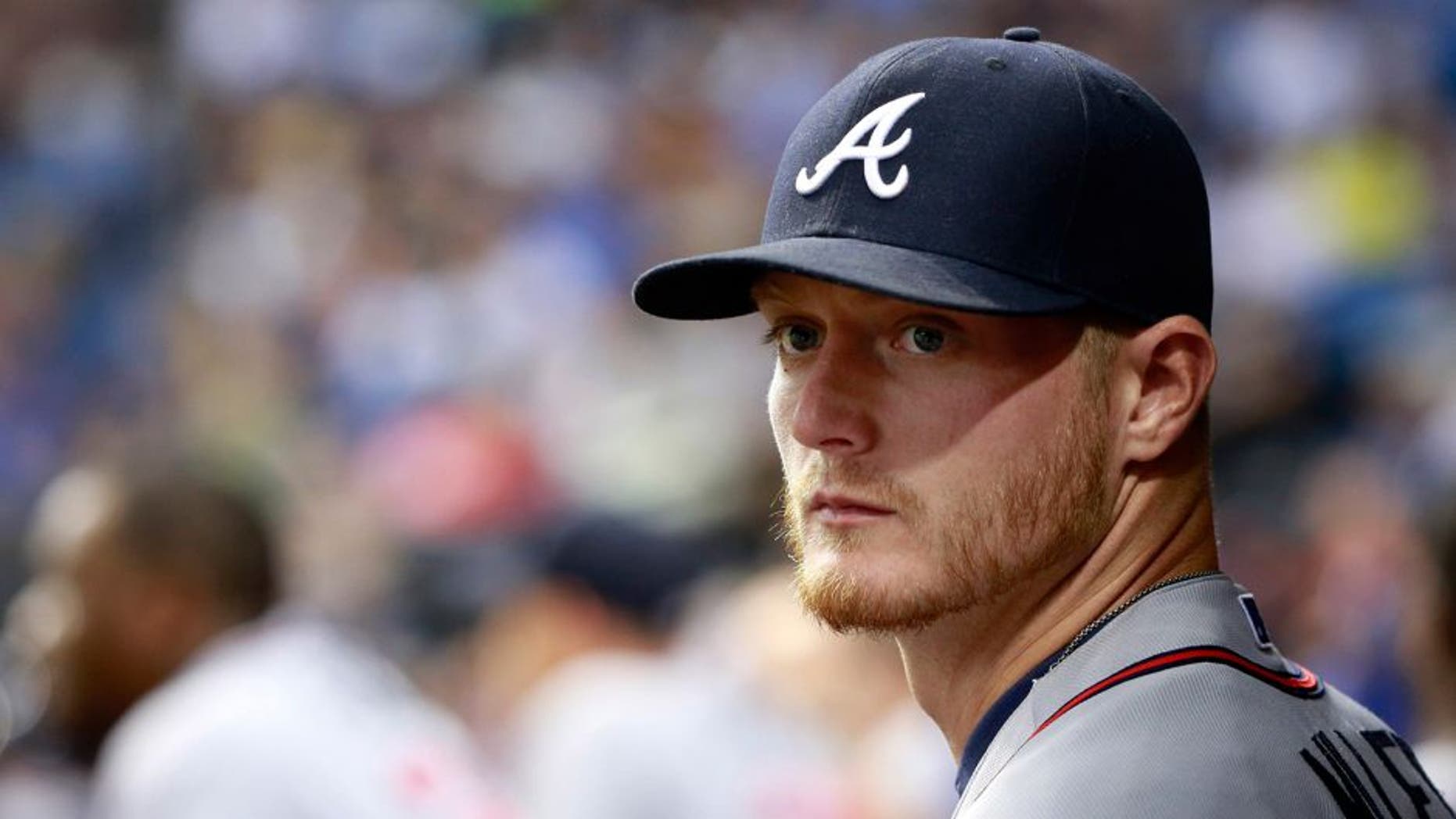 Aug 12, 2015; St. Petersburg, FL, USA; Atlanta Braves pitcher Shelby Miller (17) looks on in the dugout against the Tampa Bay Rays at Tropicana Field. Mandatory Credit: Kim Klement-USA TODAY Sports