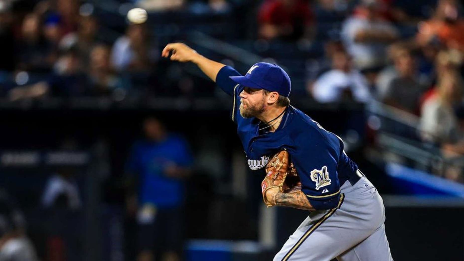 Sep 23, 2013; Atlanta, GA, USA; Milwaukee Brewers relief pitcher Michael Blazek (54) pitches in the ninth inning against the Atlanta Braves at Turner Field. The Brewers won 5-0. Mandatory Credit: Daniel Shirey-USA TODAY Sports