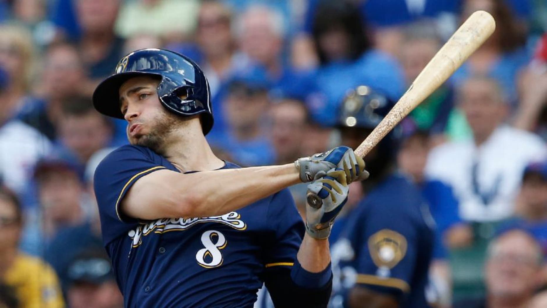 The Milwaukee Brewers' Ryan Braun hits a one-run single against the Chicago Cubs during the fourth inning.