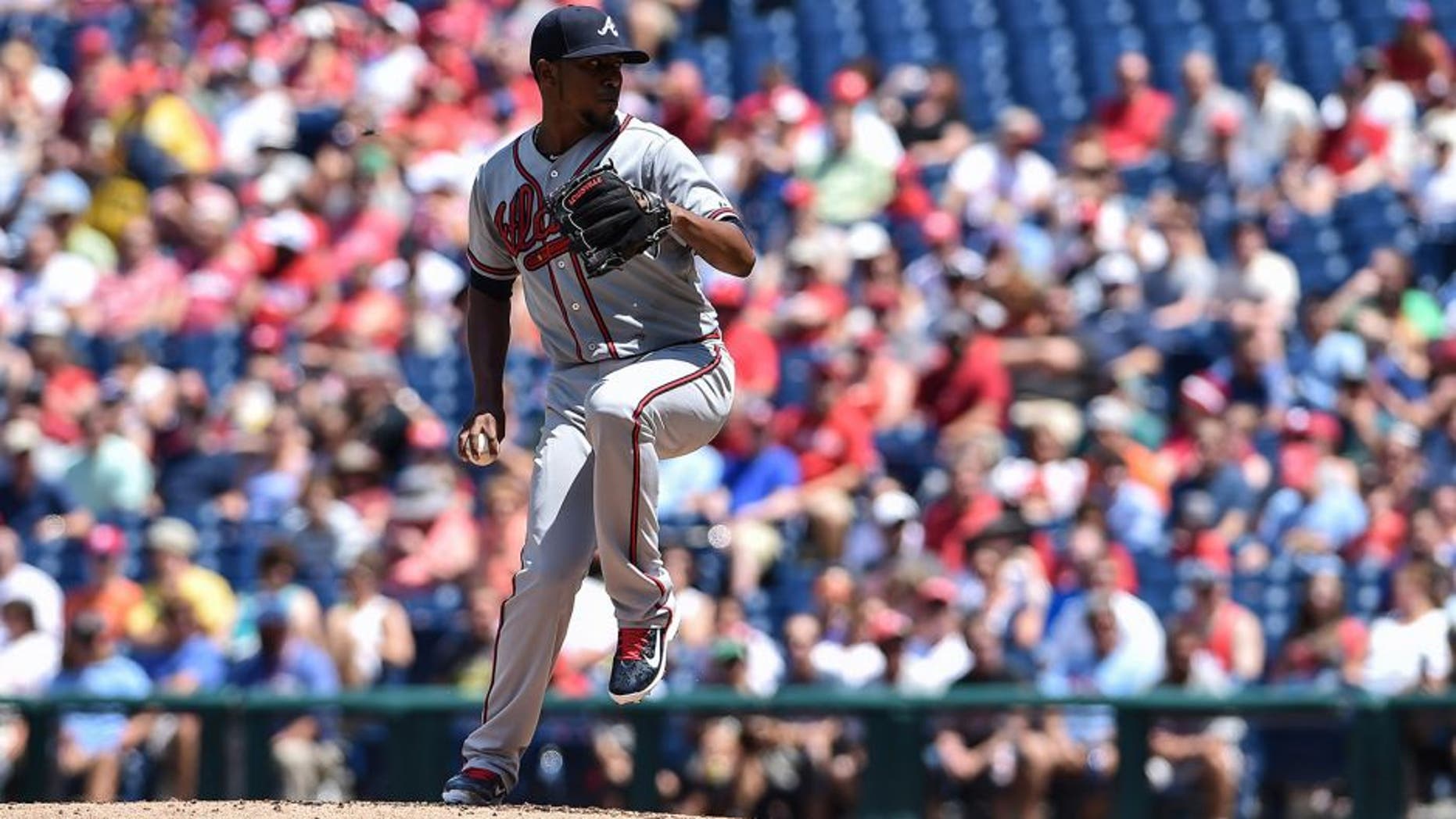 Aug 2, 2015; Philadelphia, PA, USA; Atlanta Braves starting pitcher Julio Teheran (49) pitches during the first inning of game against the Philadelphia Phillies at Citizens Bank Park. Mandatory Credit: John Geliebter-USA TODAY Sports