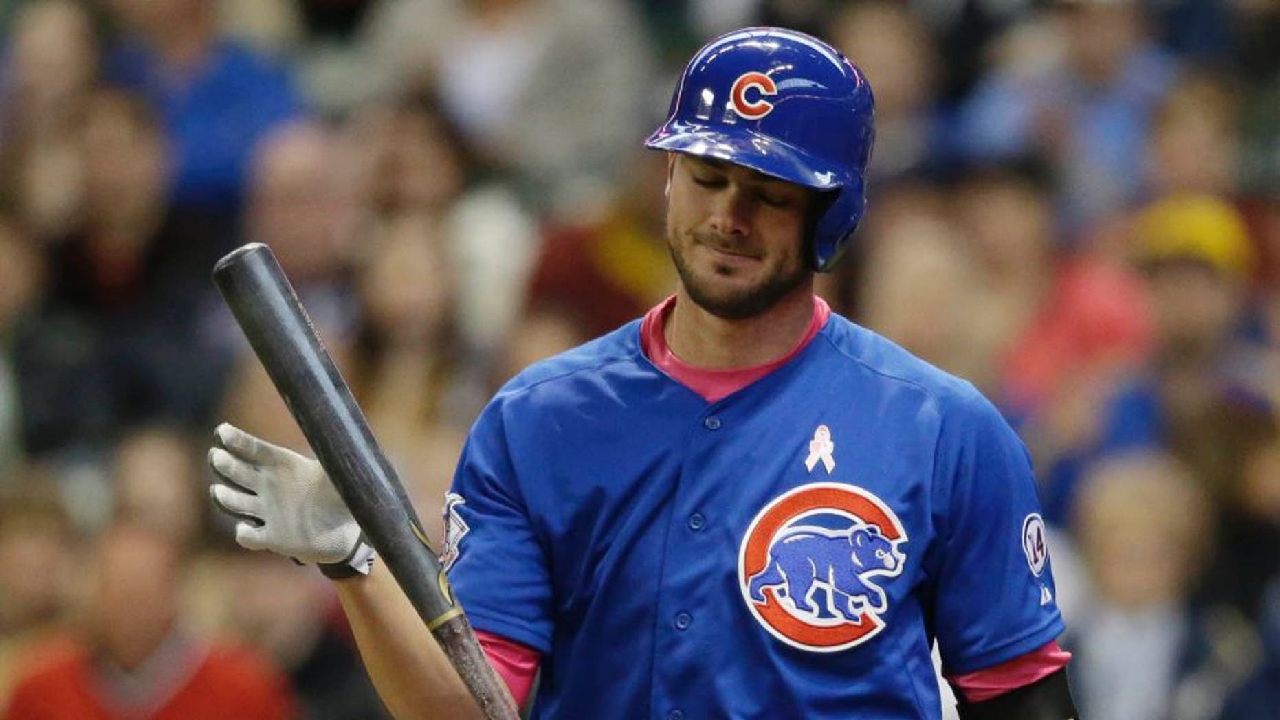 The Chicago Cubs' Kris Bryant strikes out against the Milwaukee Brewers during the first inning Sunday, May 10, 2015, in Milwaukee.