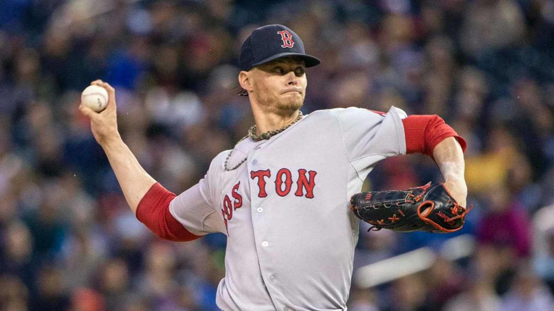 May 26, 2015; Minneapolis, MN, USA; Boston Red Sox starting pitcher Clay Buchholz delivers a pitch in the first inning against the Minnesota Twins at Target Field.
