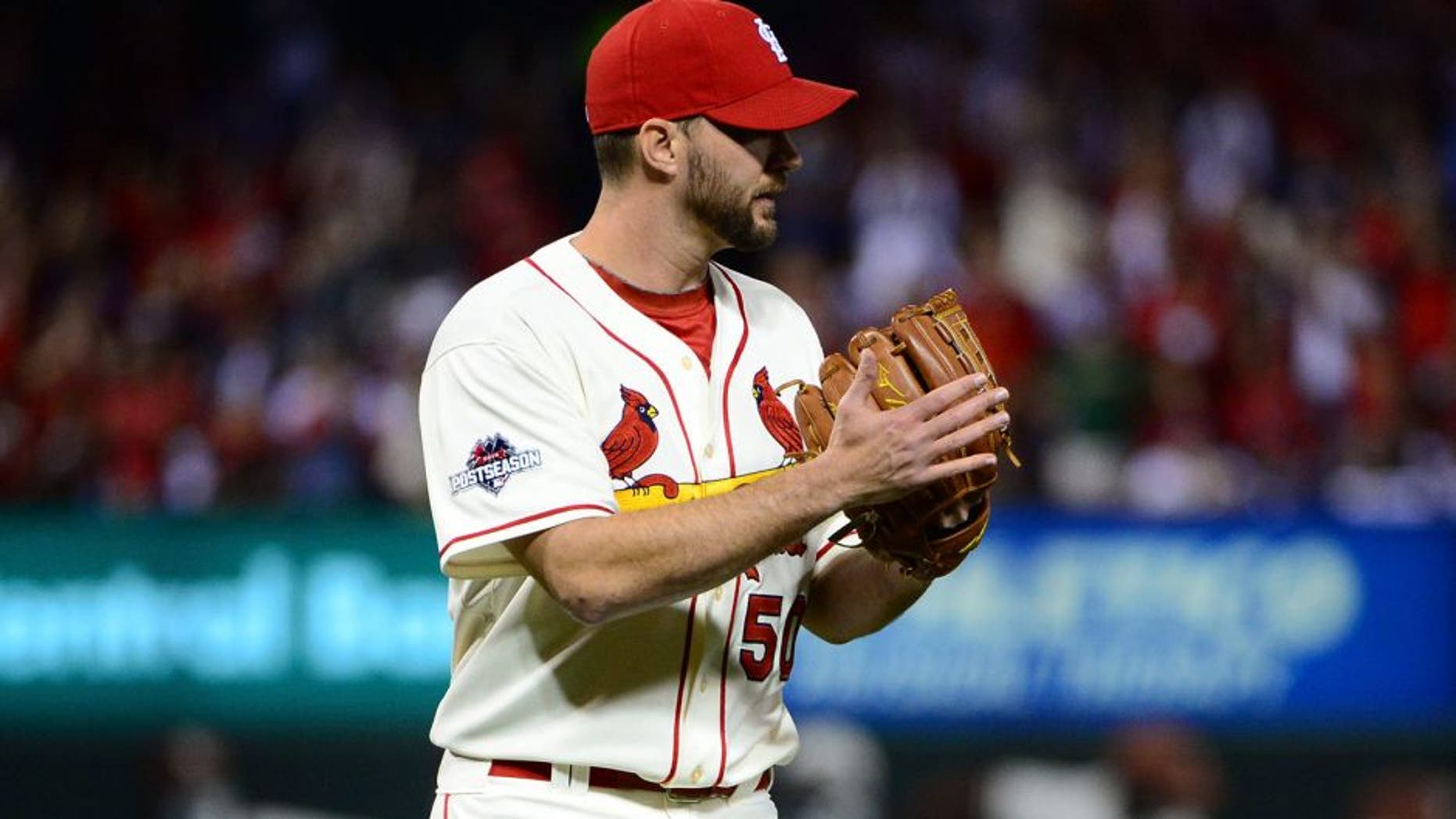 Oct 10, 2015; St. Louis, MO, USA; St. Louis Cardinals pitcher Adam Wainwright (50) reacts after ending the seventh inning in game two of the NLDS against the Chicago Cubs at Busch Stadium. Mandatory Credit: Jeff Curry-USA TODAY Sports
