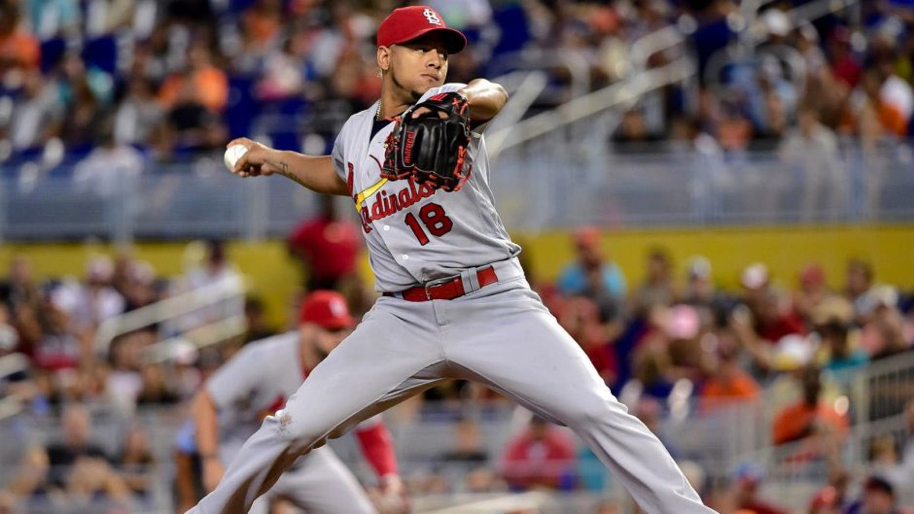 Jul 31, 2016; Miami, FL, USA; St. Louis Cardinals starting pitcher Carlos Martinez (18) delivers a pitch during the first inning against the Miami Marlins at Marlins Park. Mandatory Credit: Steve Mitchell-USA TODAY Sports