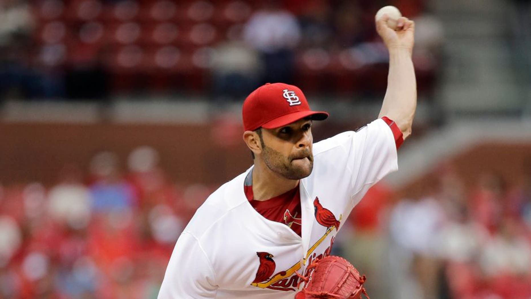 St. Louis Cardinals starting pitcher Jaime Garcia throws during the first inning of a baseball game against the San Francisco Giants, Wednesday, Aug. 19, 2015, in St. Louis. (AP Photo/Jeff Roberson)